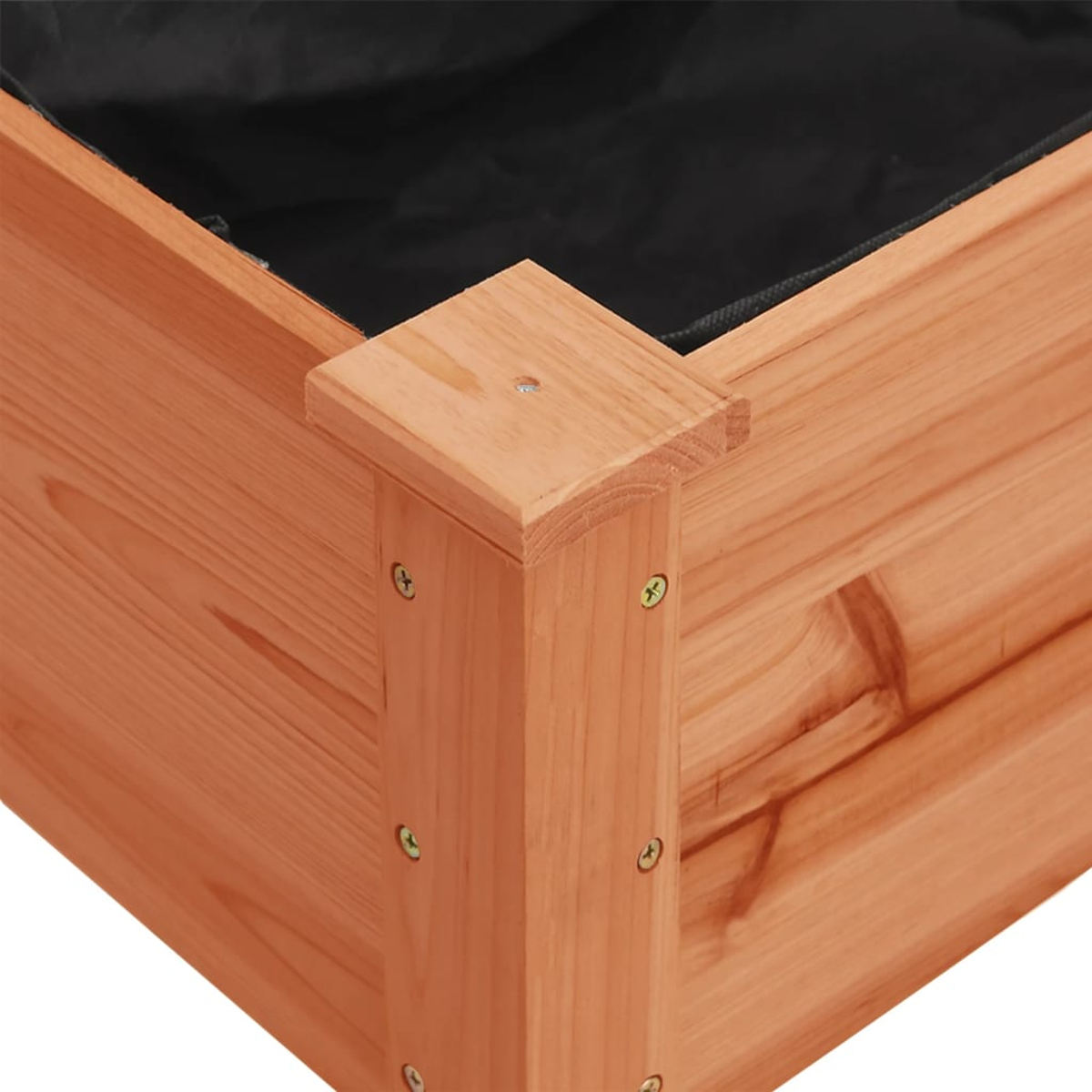 Nahaufnahme eines hölzernen Pflanzkastens. Die Kiste besteht aus hellbraunem Holz und hat innen eine schwarze Auskleidung. Schrauben sind sichtbar.