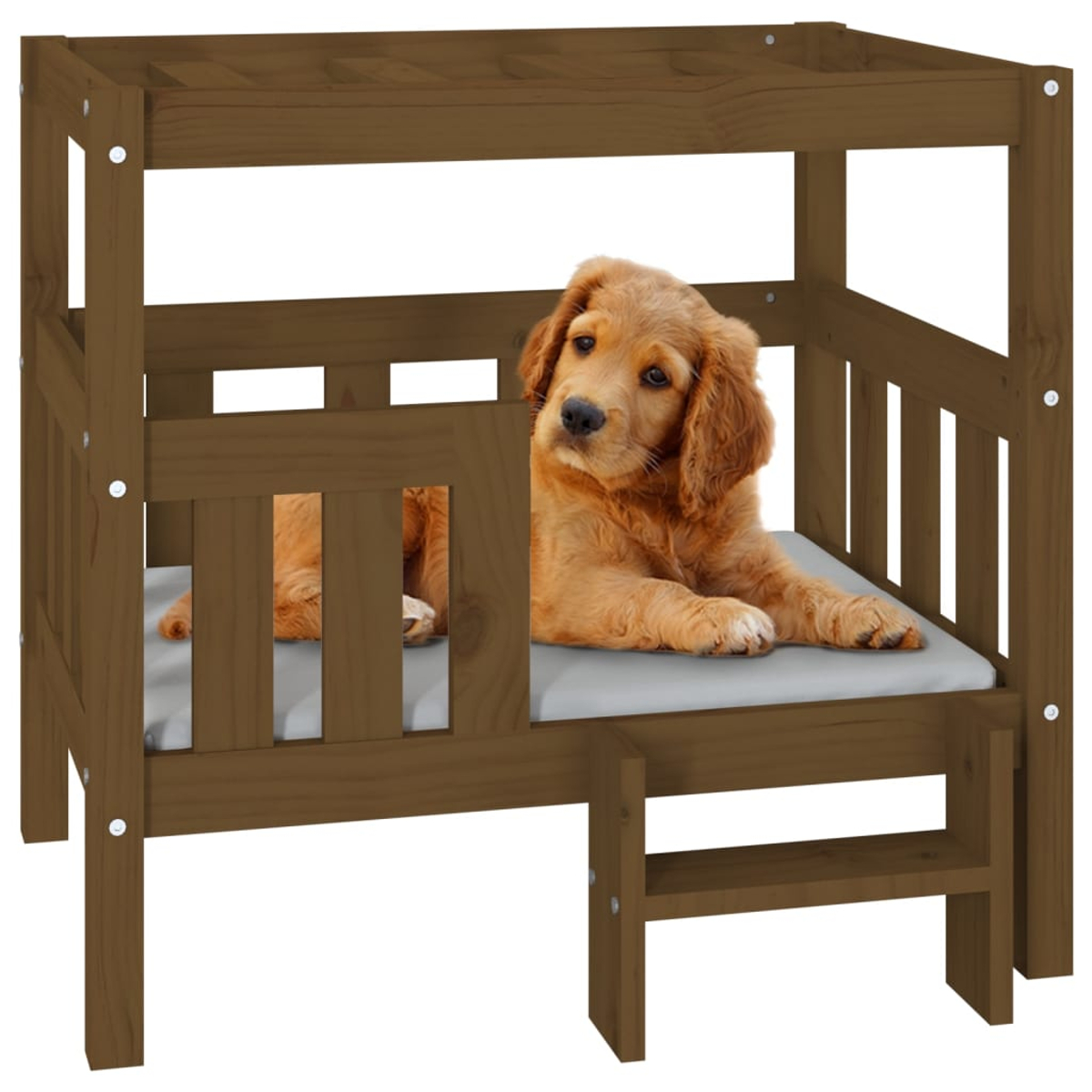 Ein goldener Retriever-Welpe liegt in einem Hundebett aus Holz. Das Bett ist braun, mit einem grauen Kissen. Der Hund schaut in die Kamera.