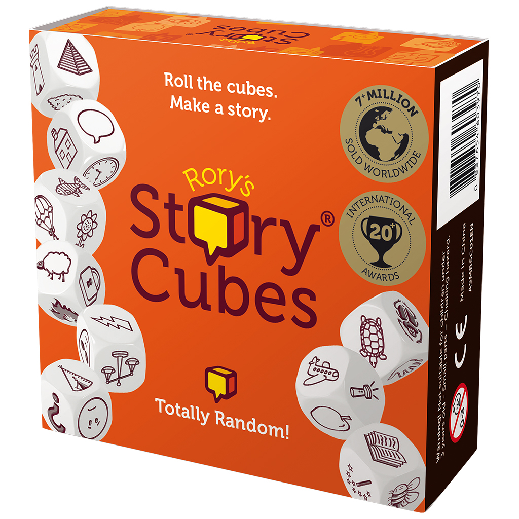 Schachtel mit Rory's Story Cubes-Spiel. Orangefarbene Schachtel mit weißen Würfeln, die verschiedene Bilder zeigen. Text: 'Würfel rollen. Erfinde eine Geschichte.'