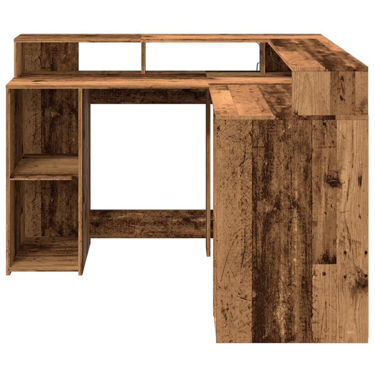 Ein hölzerner L-förmiger Schreibtisch. Er hat Regale an der Seite, ein oberes Regal und einen großen offenen Raum für einen Stuhl. Das Holz ist braun.