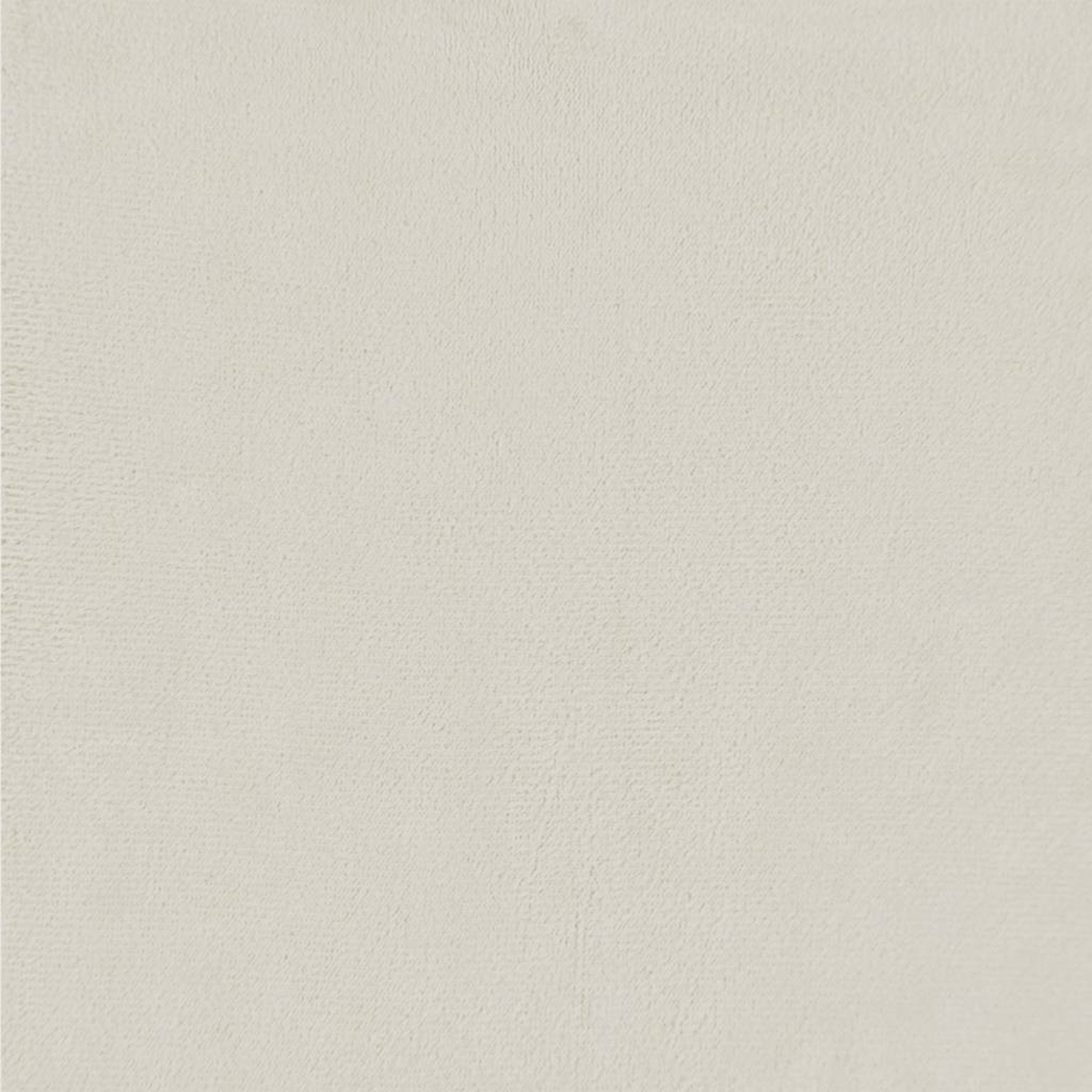Nahaufnahme einer hellbeige strukturierten Oberfläche. Die Textur wirkt leicht uneben, mit subtilen Farb- und Tiefenunterschieden.