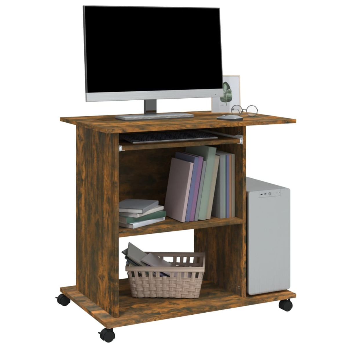 Ein Computertisch mit Monitor, Tastatur, Büchern und einem PC-Gehäuse. Er hat Regale und einen Korb. Der Tisch steht auf Rollen.