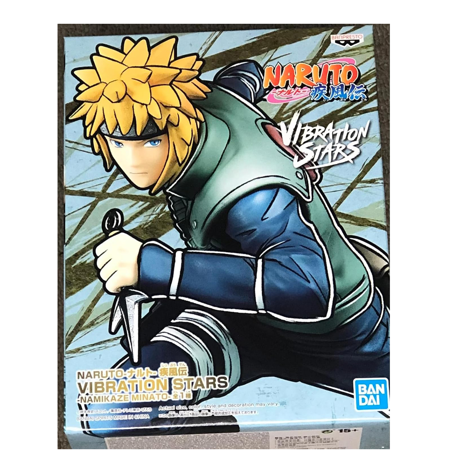 Boxart für eine Naruto-Figur. Sie zeigt Minato mit gelben Haaren, der ein Kunai hält. Auf der Box steht Vibration Stars.