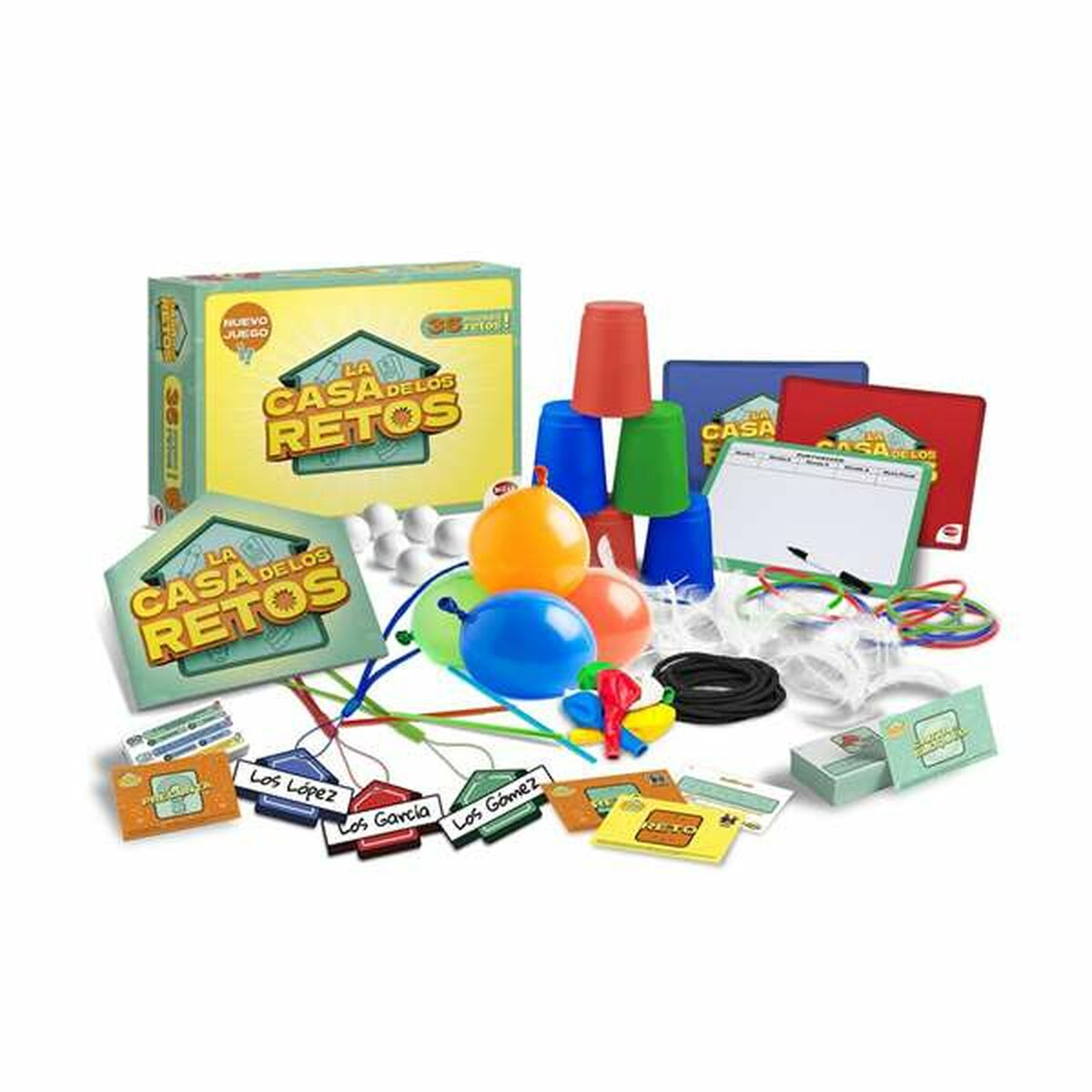 Juego con vasos, pelotas, cartas y caja 'La Casa de los Retos'. Varios colores y formas están presentes.