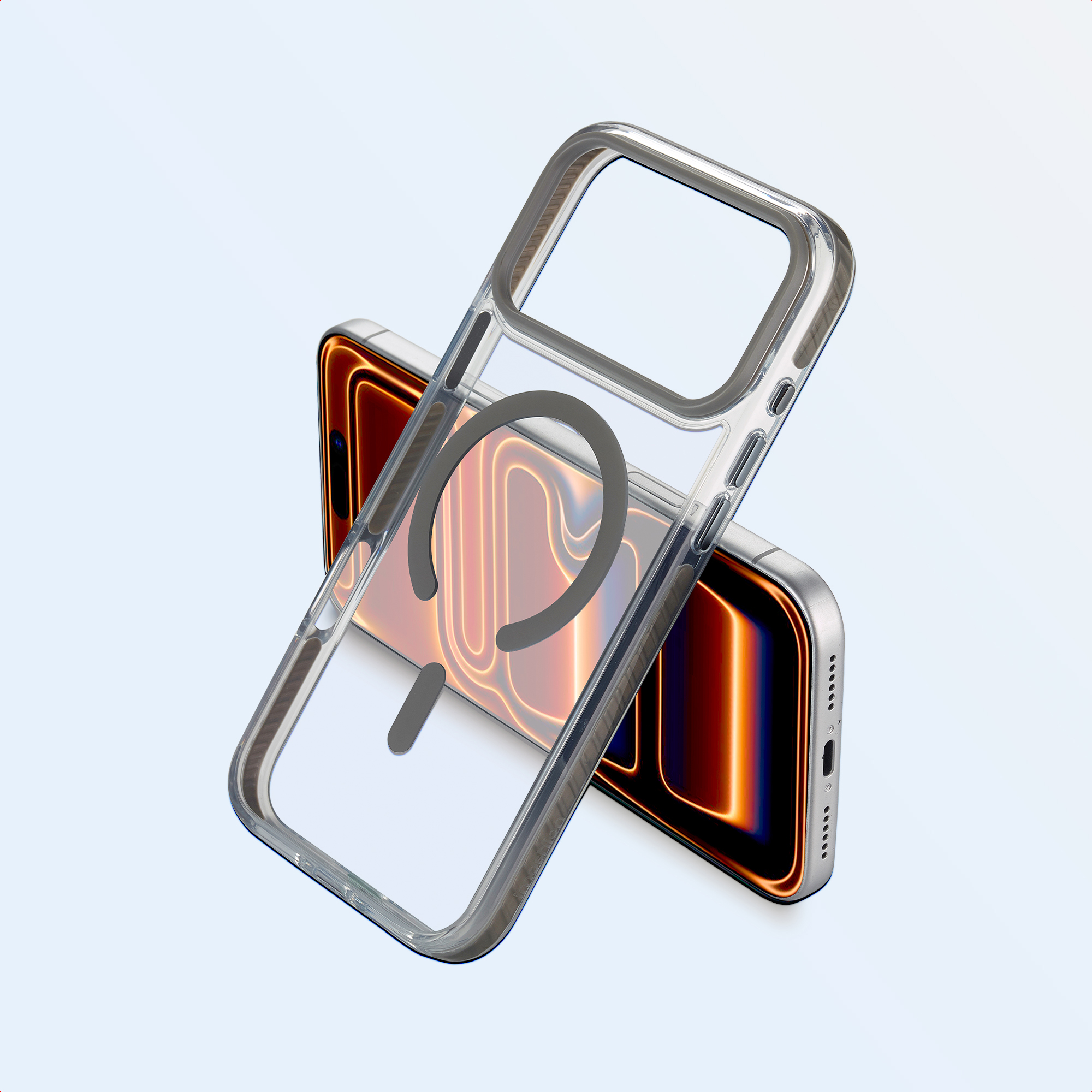 Deux smartphones, un avec une coque transparente et un design d'anneau magnétique. L'écran affiche une lueur néon orange.