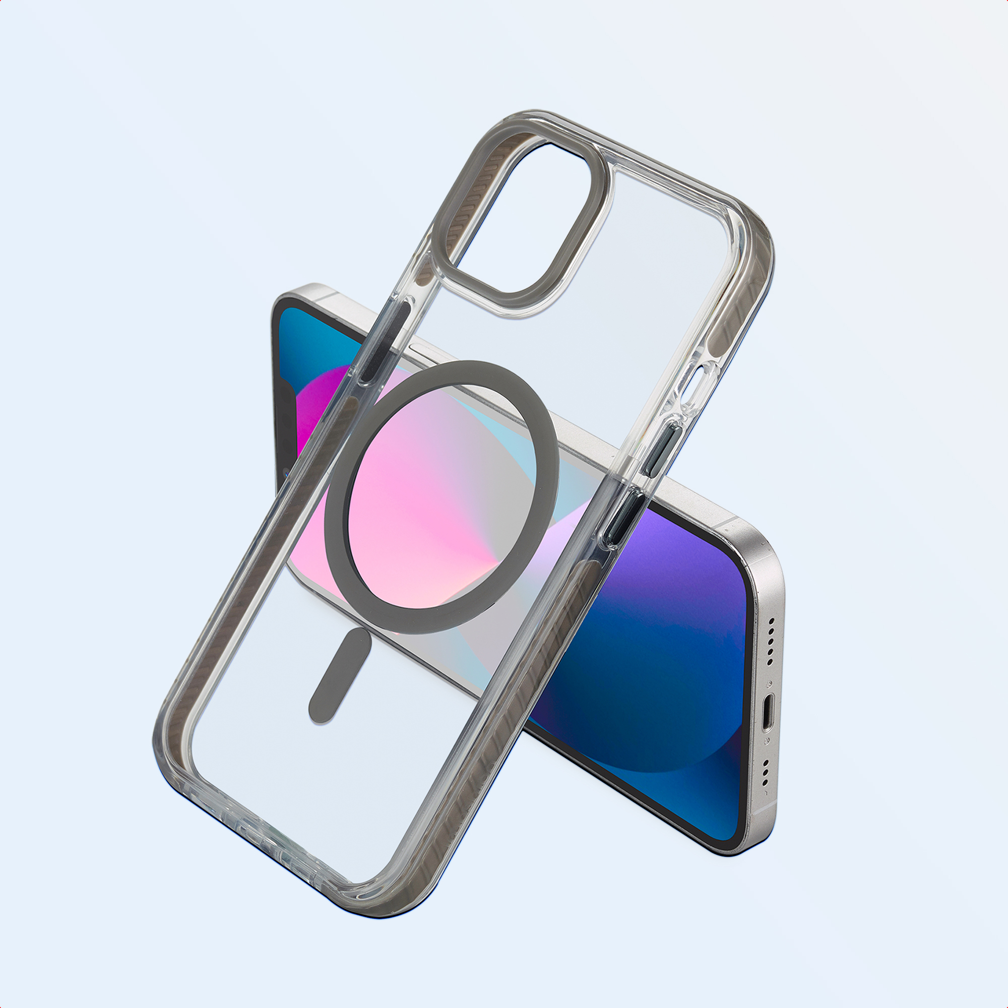 Een doorzichtige telefoonhoes rust op een telefoon. De hoes heeft een grijze magnetische ring en een grijze rechthoek.
