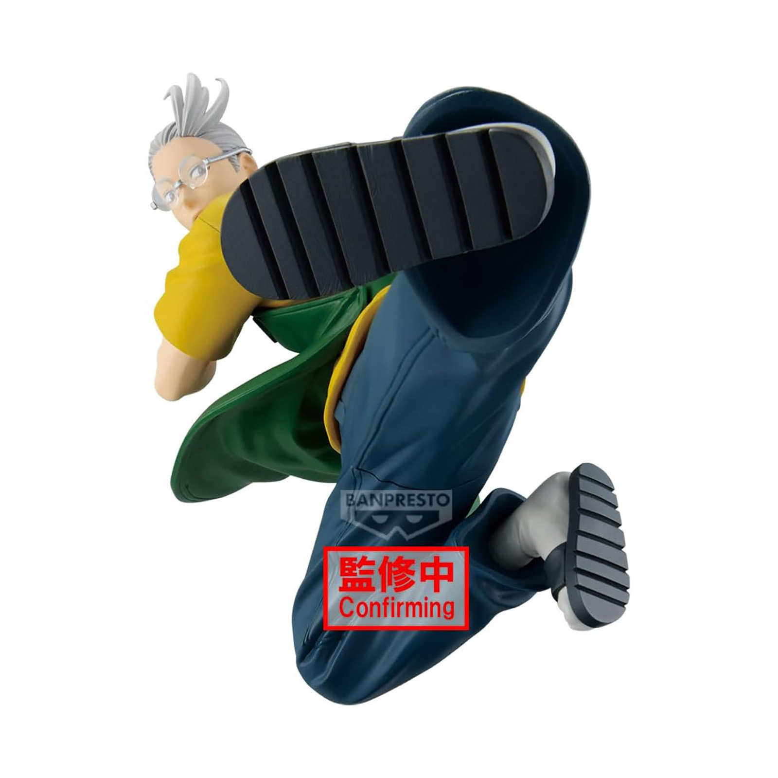 Figura de un anciano en acción, camisa amarilla, capa verde, pantalones azules. La figura está saltando.