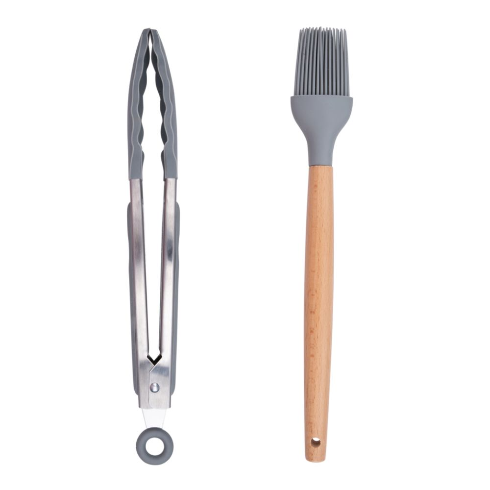 Image shows a pair of grey tongs and a grey silicone brush with a wooden handle, isolated on a white background.