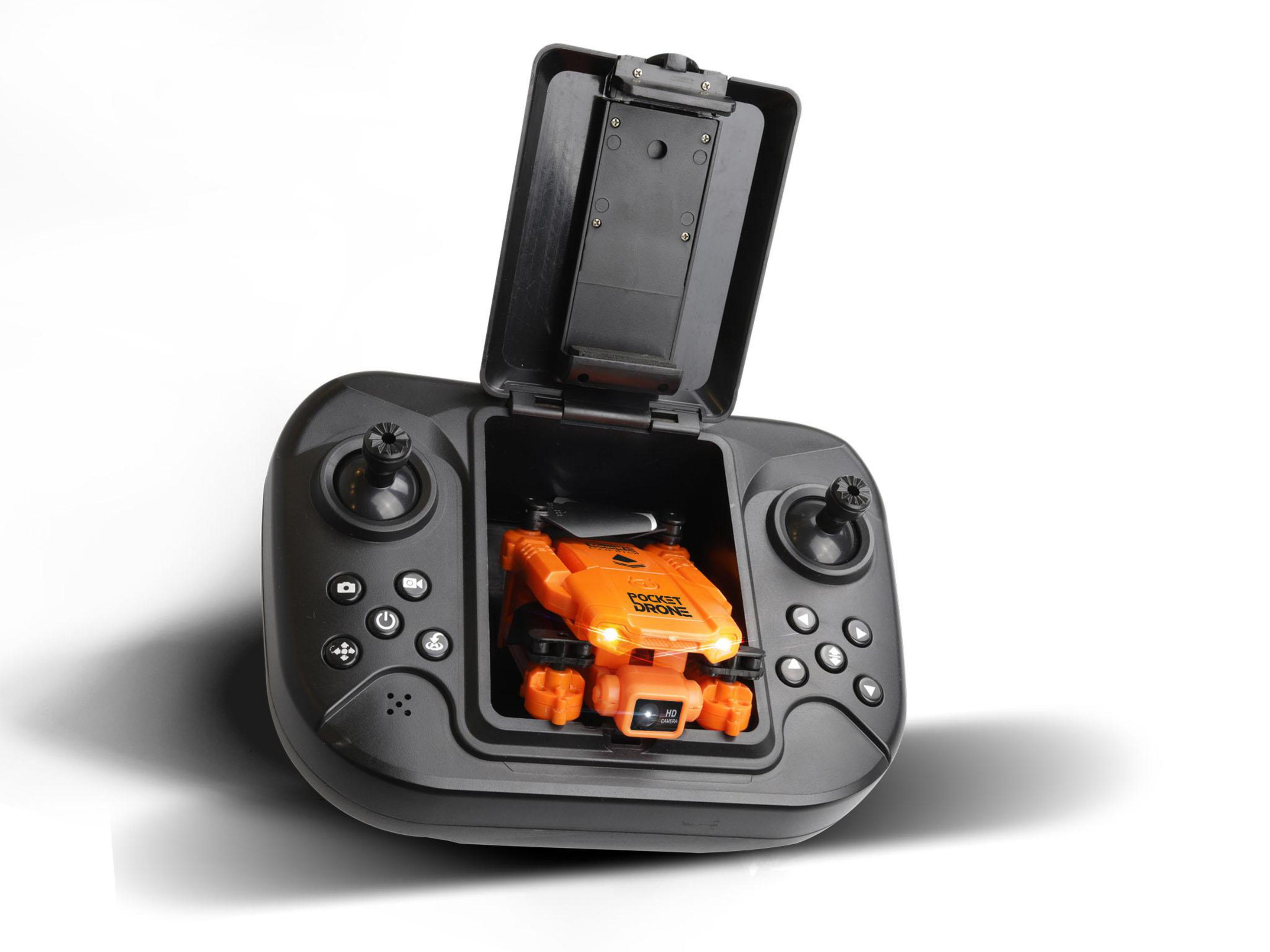 Schwarze Drohnensteuerung mit orangefarbener Drohne im Inneren. Knöpfe und Joysticks sind sichtbar. Weißer Hintergrund.