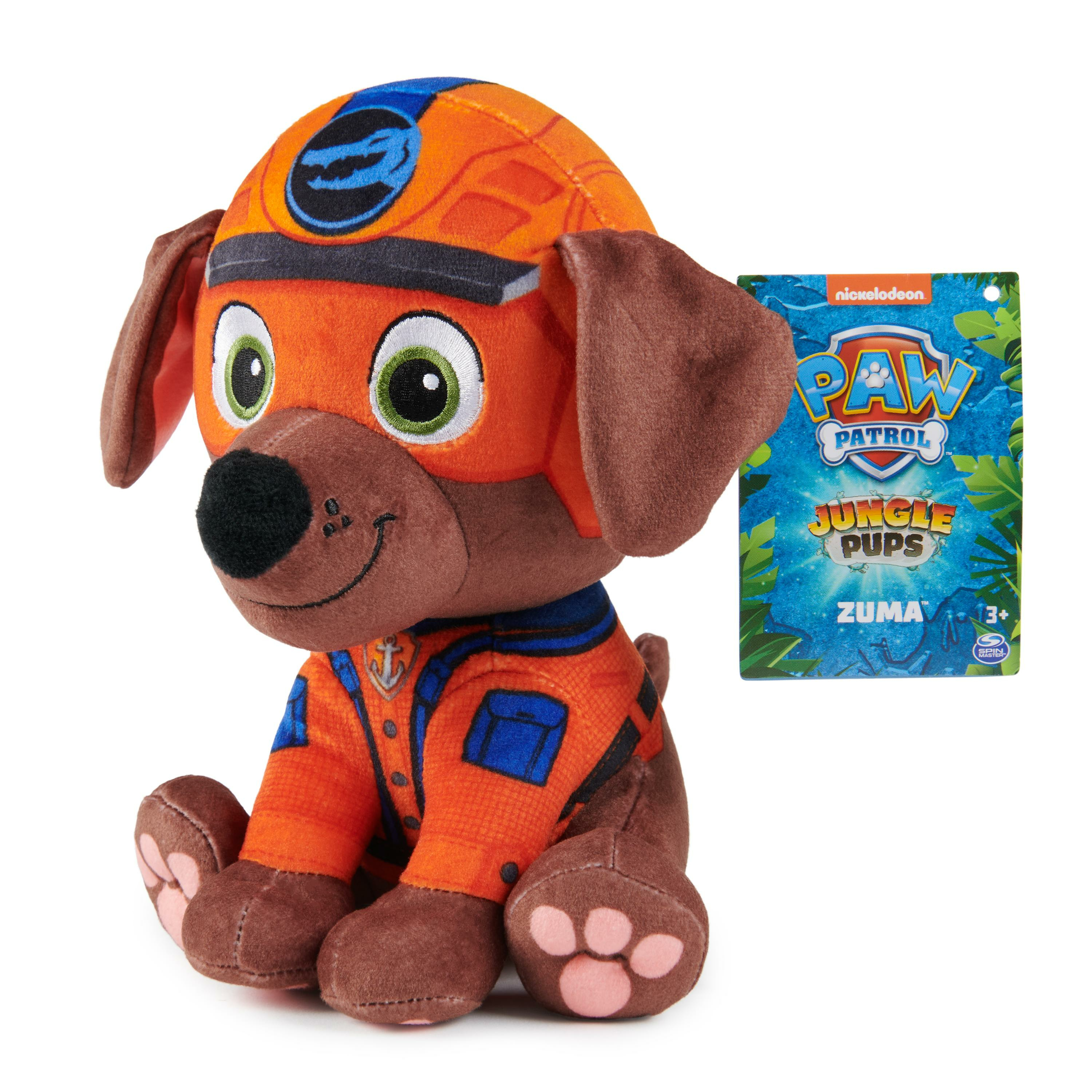 Ein Zuma Paw Patrol Plüschtier, orange und braun, mit einem Jungle Pups-Etikett, auf weißem Hintergrund.