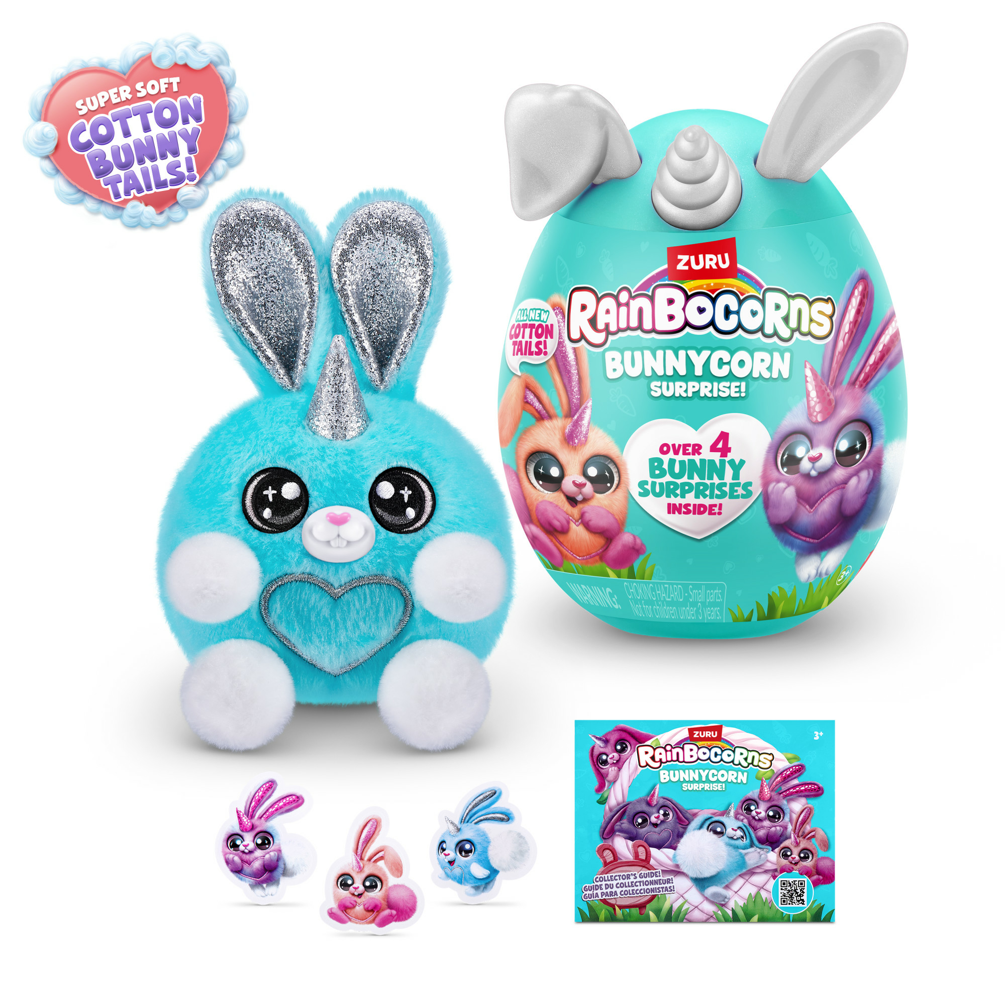 L'immagine mostra un coniglietto blu giocattolo con orecchie e corno glitterati, un uovo, adesivi e una scatola, che promuovono 'Rainbocorns Bunnycorn'.