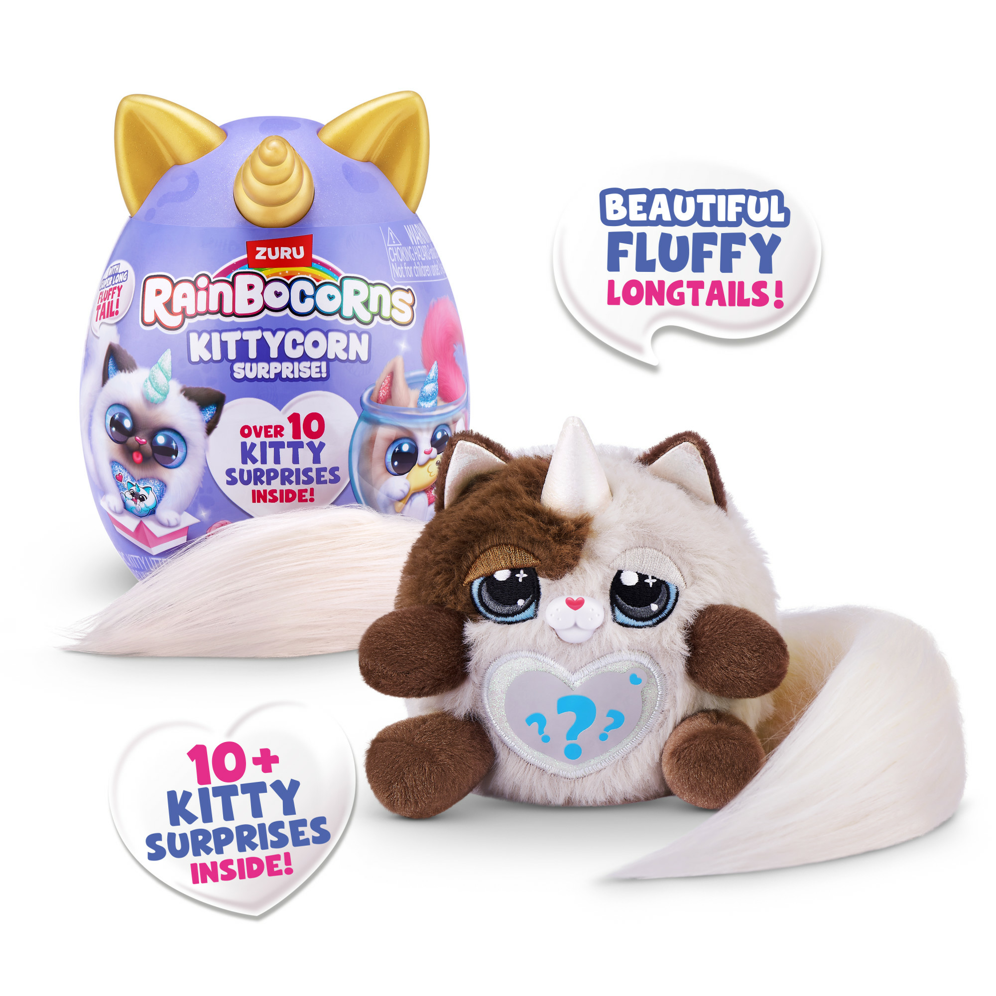 L'immagine presenta un peluche kittycorn con un uovo a sorpresa, fumetti e etichette a forma di cuore.