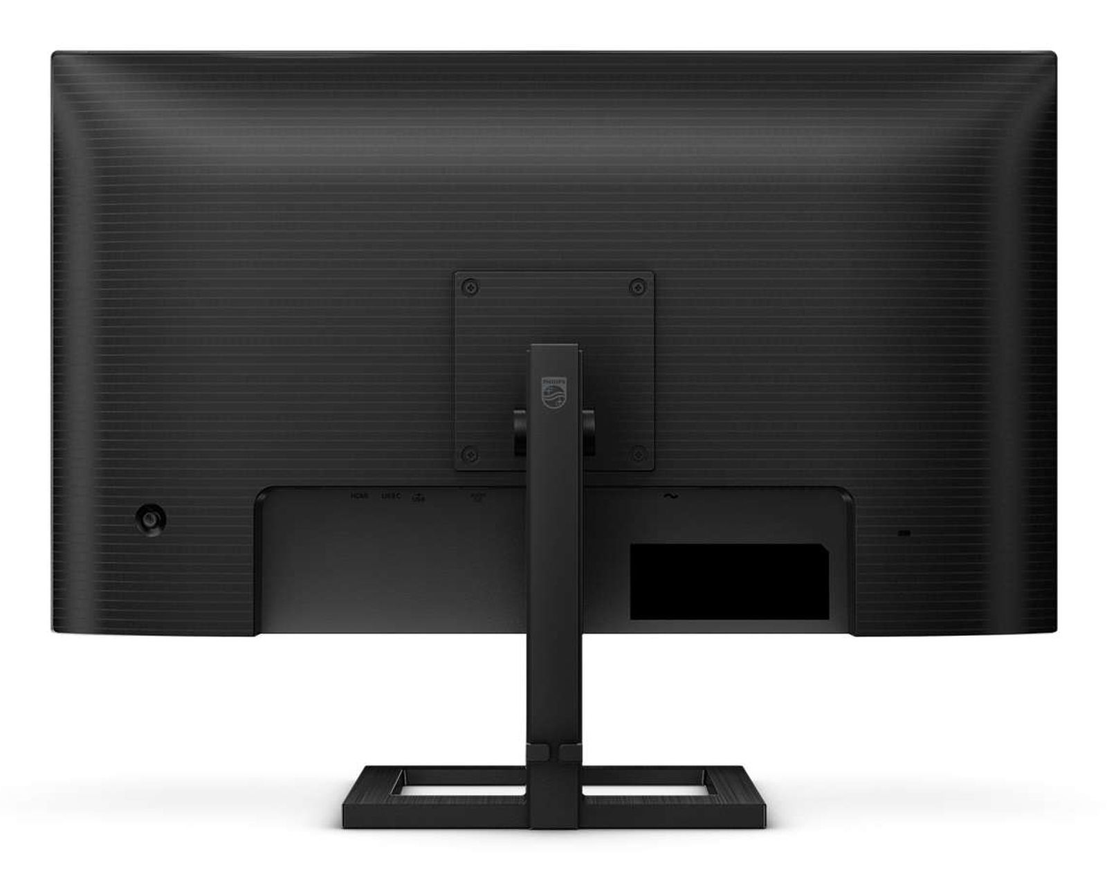 Tył czarnego monitora Philips ze stojakiem. Widoczne porty. Monitor stoi na białej powierzchni.