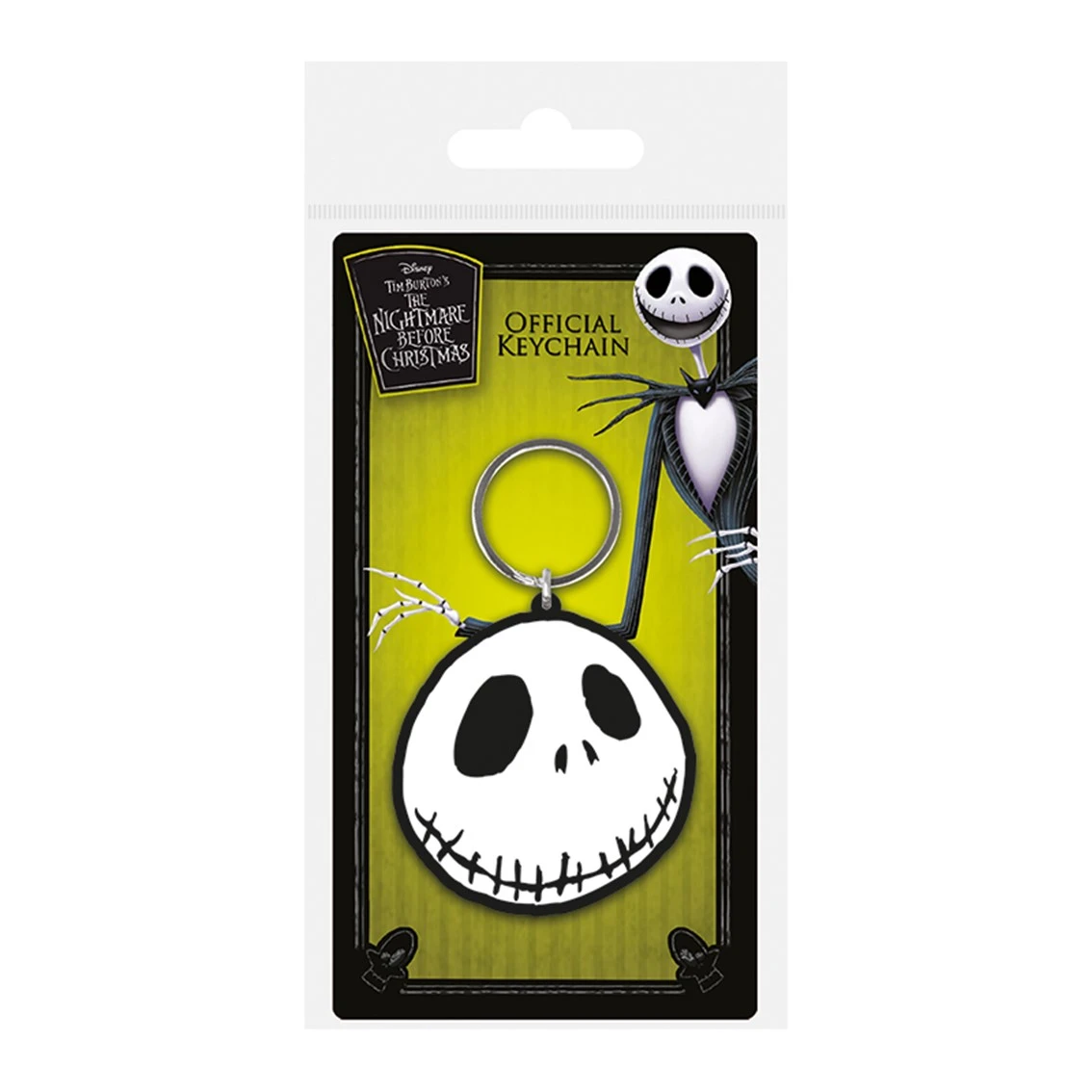 Un llavero de Pesadilla Antes de Navidad en un paquete. La cara de Jack Skellington está en el llavero. El paquete tiene un fondo verde.