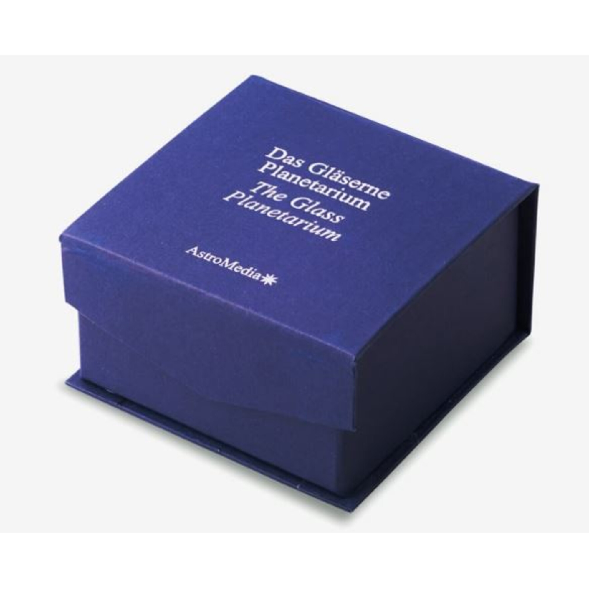 Eine dunkelblaue Schachtel mit weißem Text: Das Gläserne Planetarium, The Glass Planetarium, AstroMedia.
