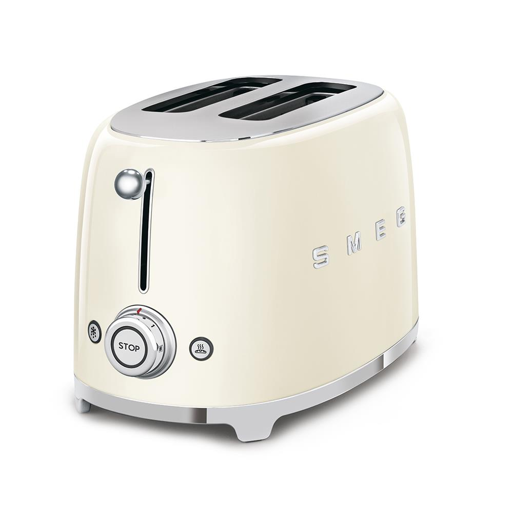 Beyaz bir yüzey üzerinde krem rengi bir Smeg tost makinesi. İki ekmek yuvası, bir kol ve 'DUR' düğmesi olan bir kadranı var.