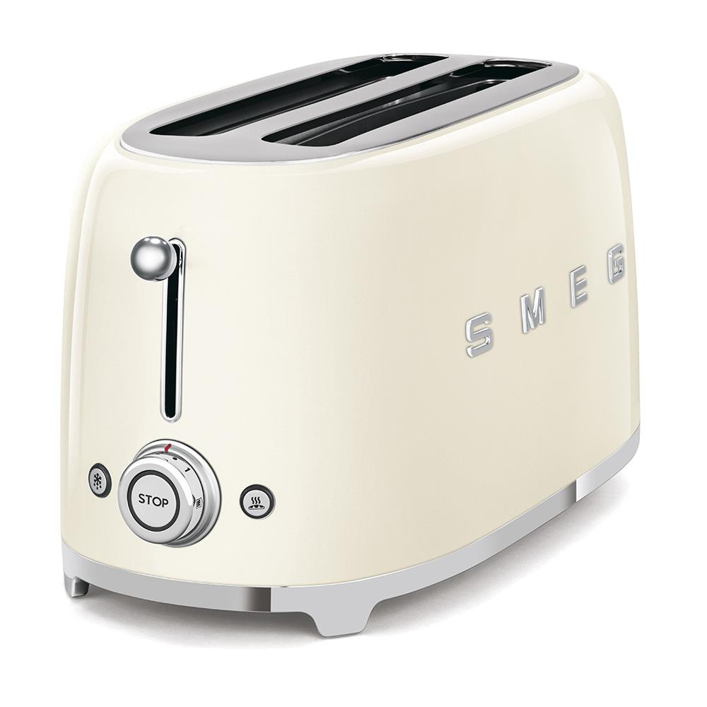 İki yuvası, bir kolu ve bir durdurma düğmesi olan krem renkli bir SMEG tost makinesi. Krom detaylar. SMEG kelimesi yan tarafta.
