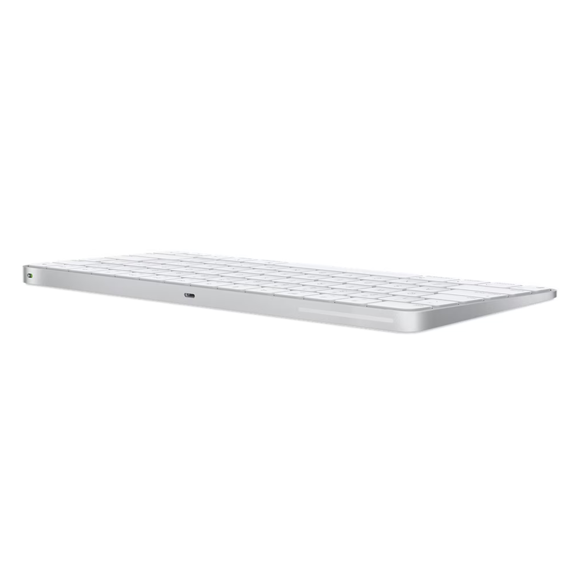 A silver Apple Magic Keyboard on a white background. It has a low profile and is angled slightly.