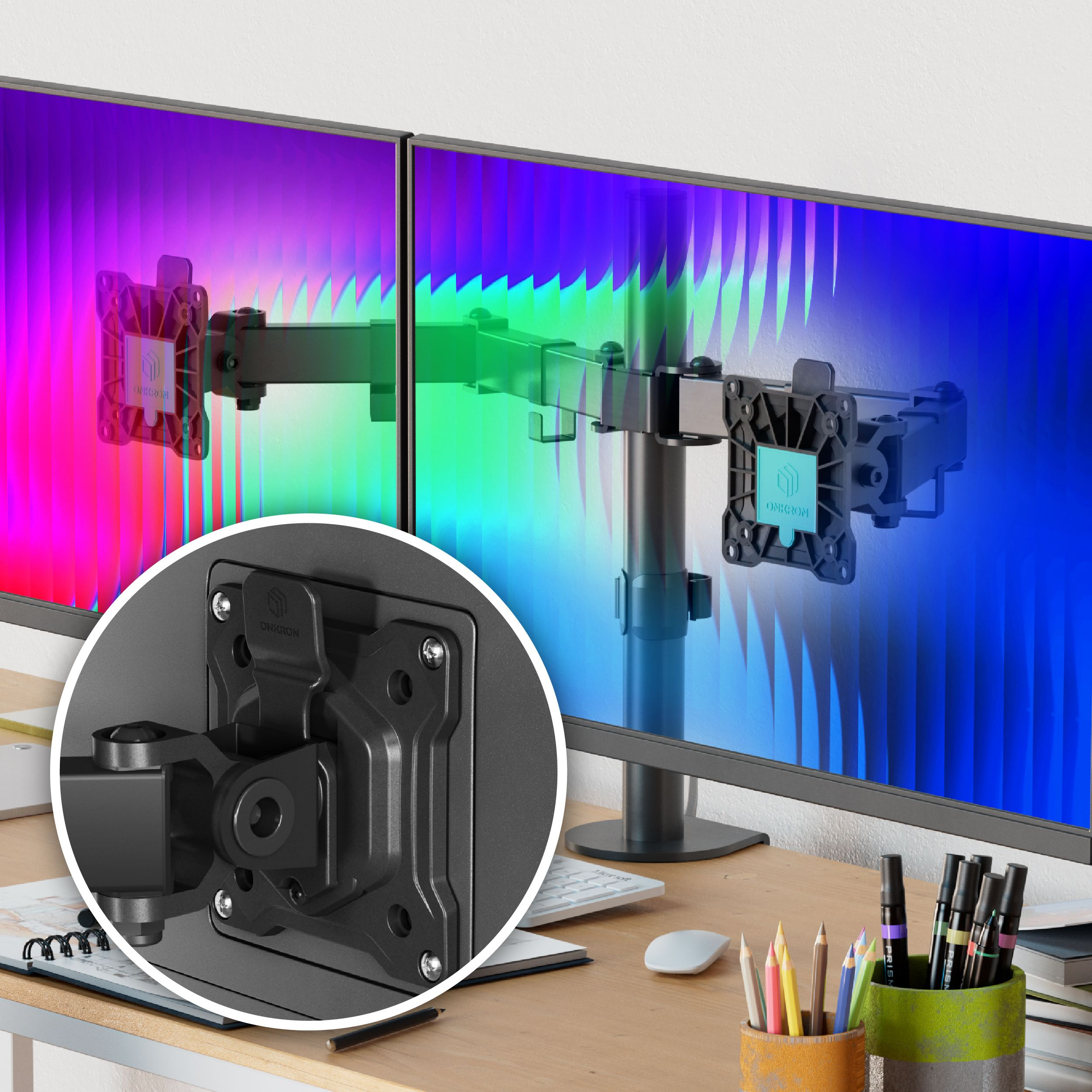 Due monitor con sfondi colorati. Sono visibili un braccio per monitor e un primo piano del supporto.
