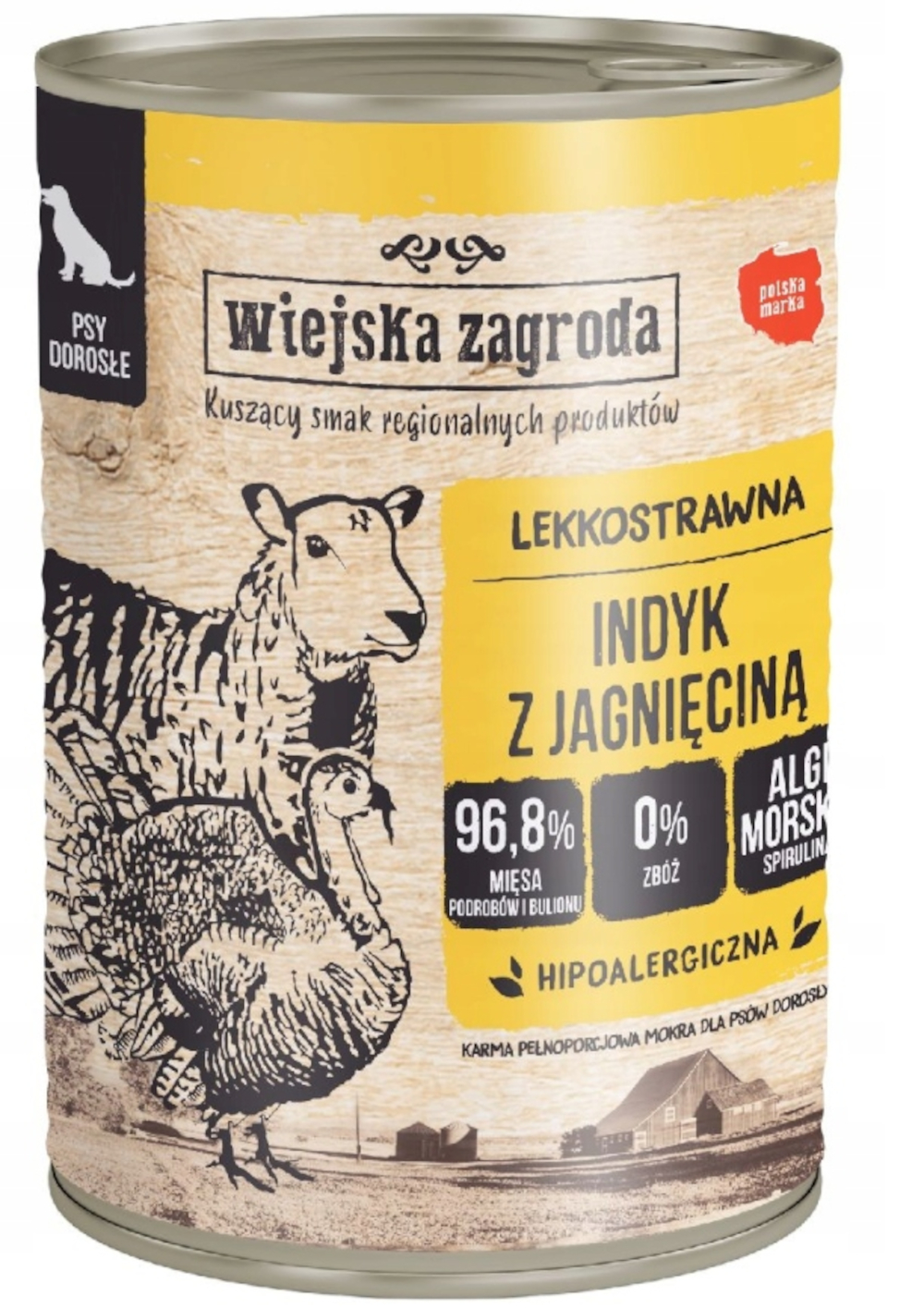 Puszka karmy dla psów. Przedstawia owcę, indyka i tekst. Puszka oznaczona 'Wiejska Zagroda' z wyróżnionym 'Indyk z Jagnięciną'.