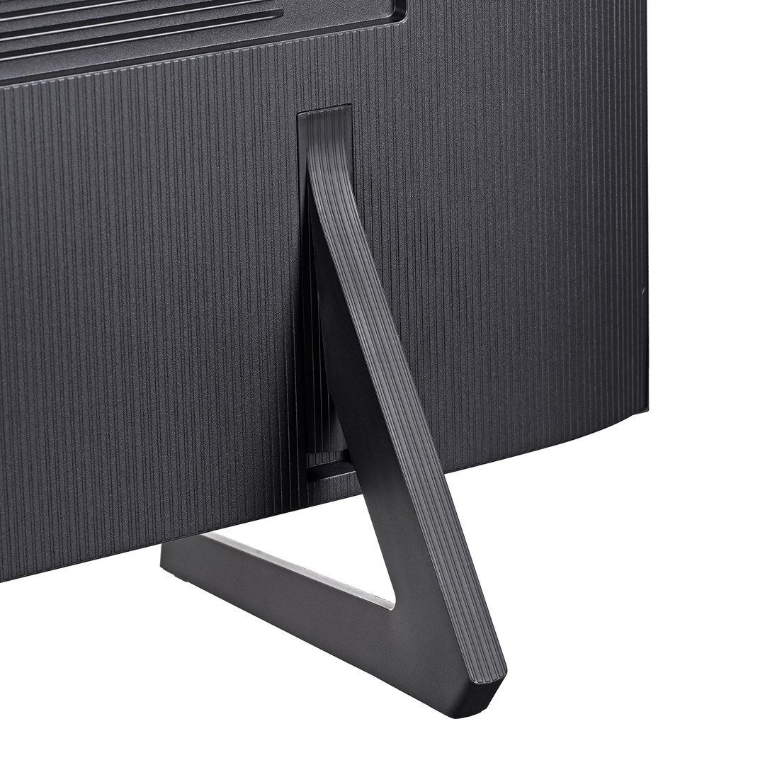 Primer plano de la parte trasera de un monitor negro con un soporte en forma de V. La parte trasera tiene líneas verticales.