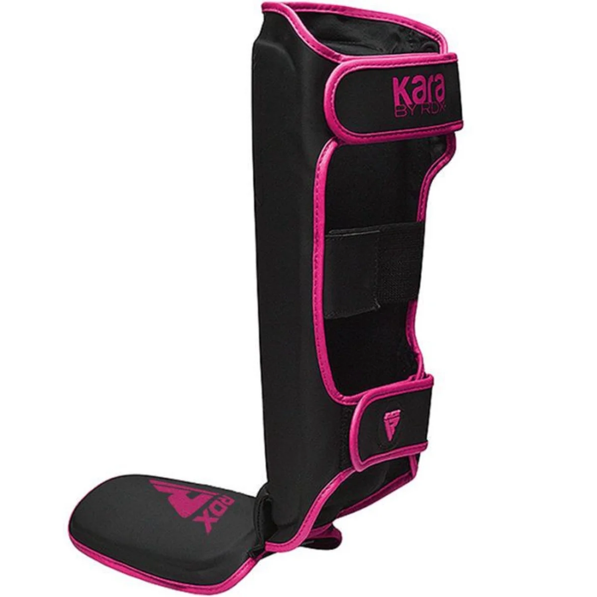 A black and pink shin guard. It has the brand name 'Kara by RDX'. The shin guard has padding and straps for secure fit.