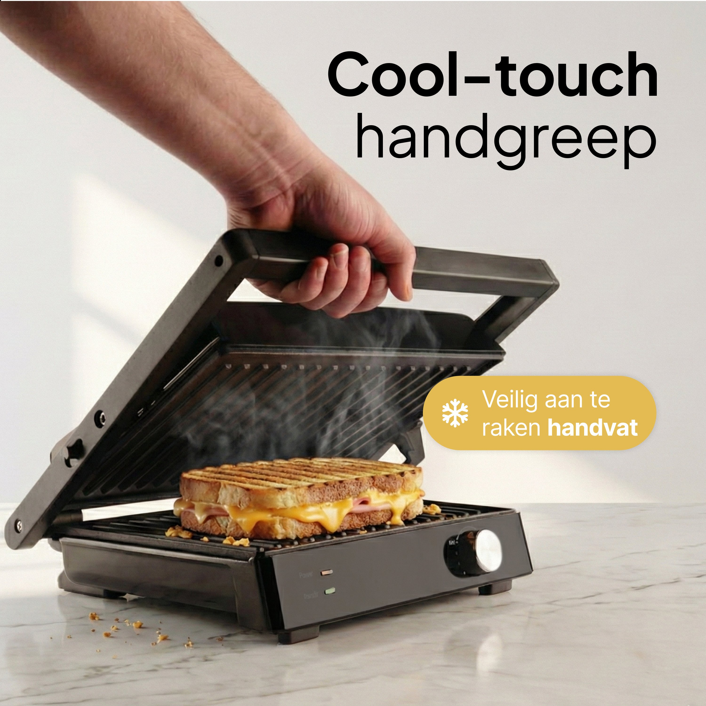A hand opens a black sandwich press with a grilled cheese sandwich inside. Steam rises. Text: Cool-touch handgrip.