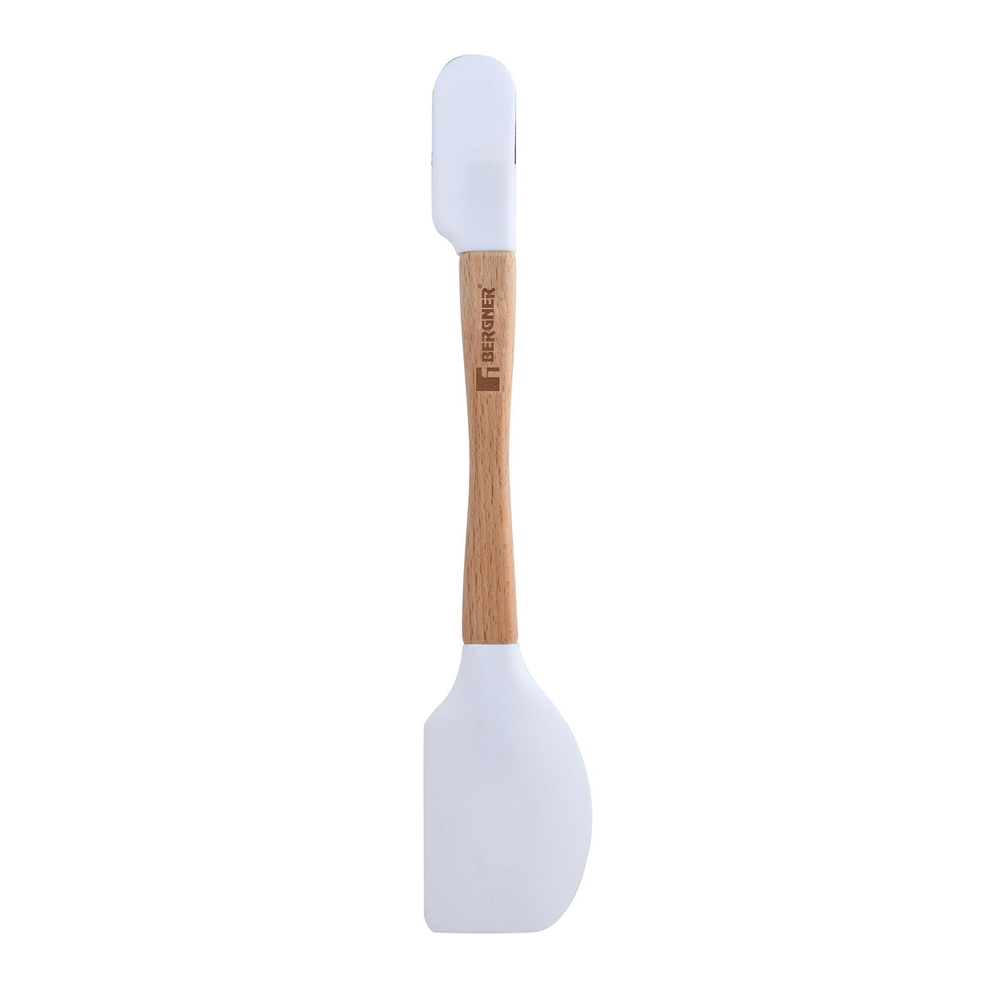 Una espátula de silicona blanca con mango de madera. La espátula es vertical, con la marca 'BERGNER' en el mango.
