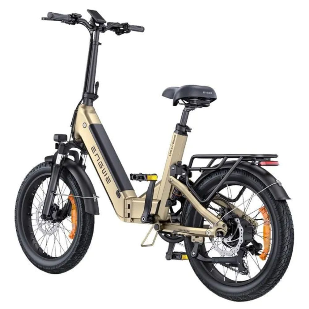 Una bicicletta elettrica beige e nera. Il marchio è visibile. Ha pneumatici grandi, un sedile, manubrio e portapacchi.