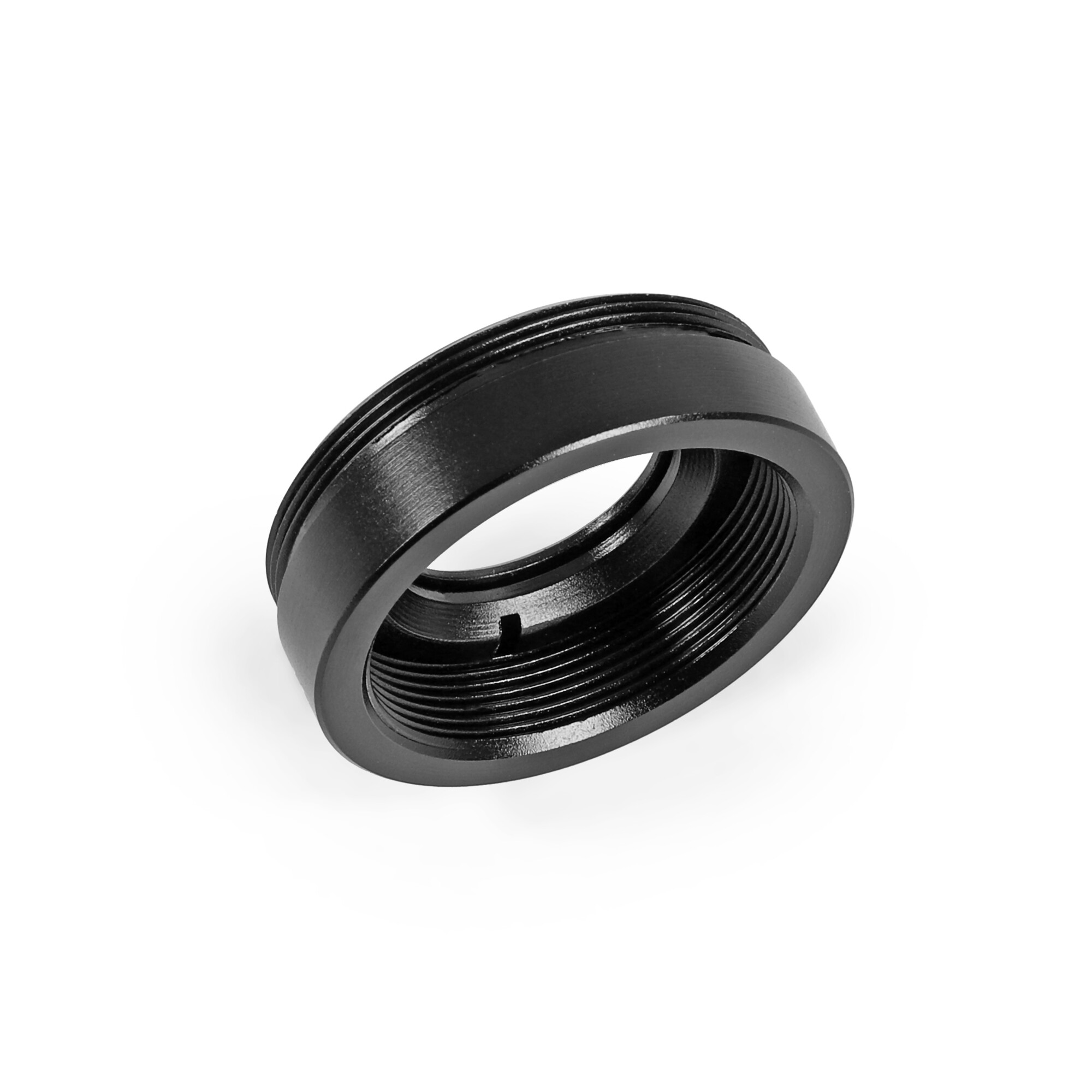 Ein schwarzer, mit Gewinde versehener Metallring liegt auf einer weißen Oberfläche. Der Ring hat eine Innen- und eine Außengewindeoberfläche.