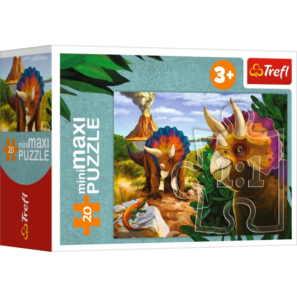 Boîte de puzzle avec une image de Tricératops. Elle montre un volcan, d'autres dinos et un lézard. Le puzzle est pour les 3 ans et plus.