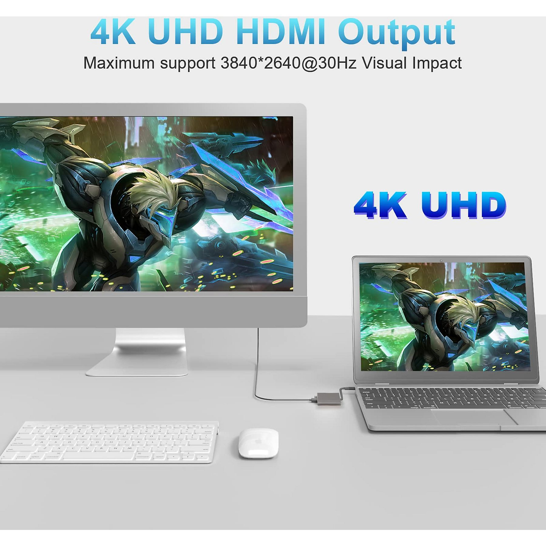Ein Computermonitor und ein Laptop, die ein Videospiel anzeigen. Eine Tastatur und eine Maus befinden sich im Vordergrund.
