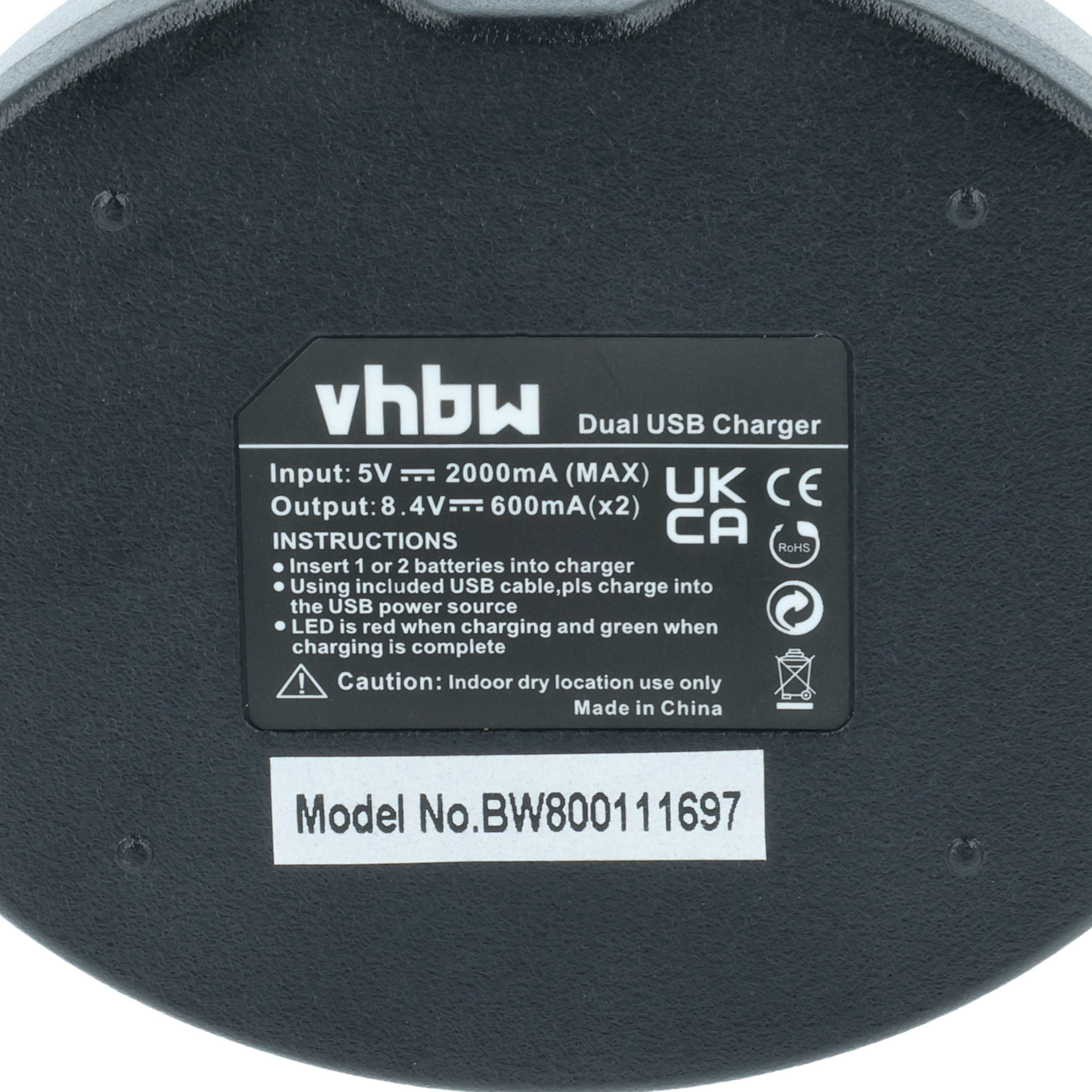 Schwarzes Dual-USB-Ladegerät mit weißem Text, einschließlich Eingangs-/Ausgangsdetails und Anweisungen.