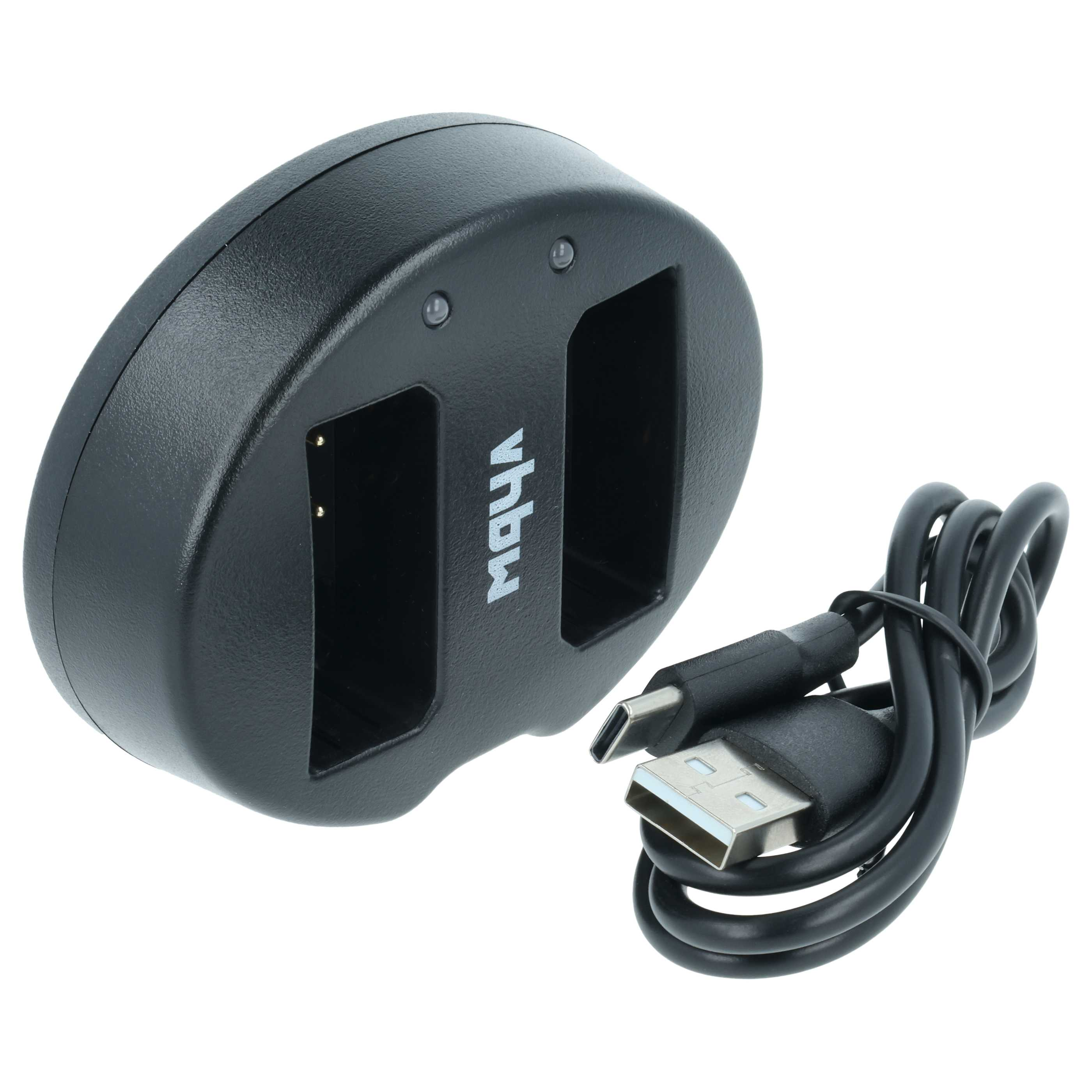 Schwarzes Dual-Akkuladegerät mit USB-Kabel. Das Ladegerät trägt den Markennamen 'vhbw'. Weißer Hintergrund.
