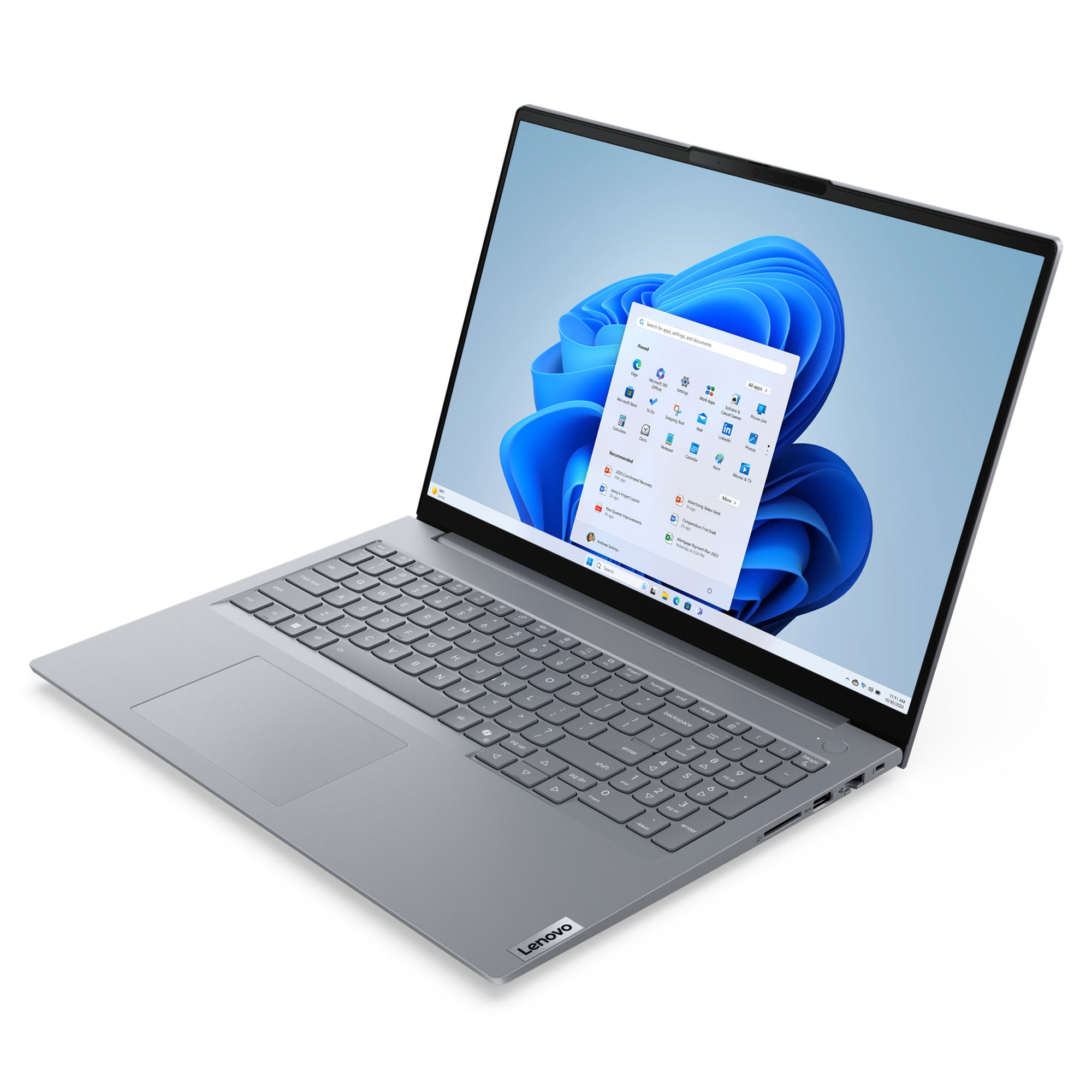 Windows 11 ekranı açık bir Lenovo dizüstü bilgisayar. Dizüstü bilgisayar gri, beyaz bir yüzey üzerinde.