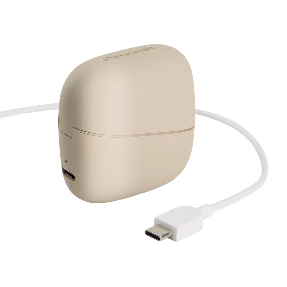 Ein beiges Panasonic-Gerät mit weißem Kabel und USB-C-Anschluss. Das Gerät ist eiförmig.