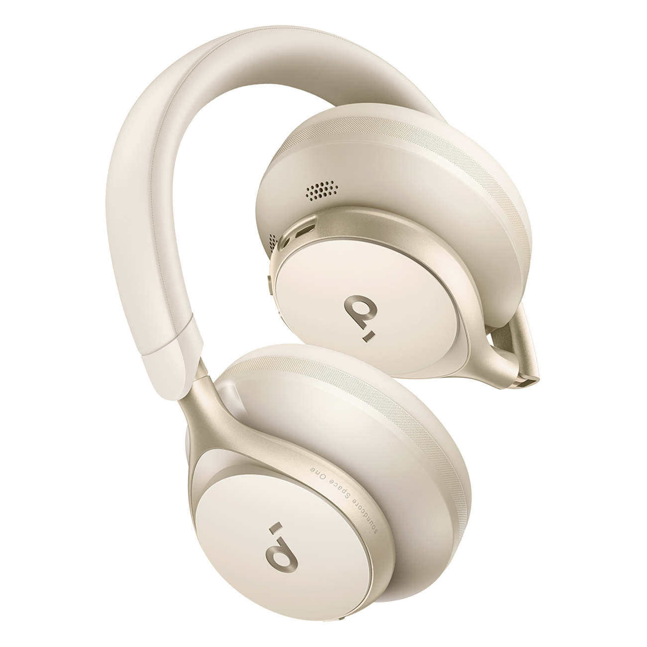 Kremowe słuchawki nauszne, ustawione pod kątem. Logo marki widoczne na nausznicach. Na białym tle.