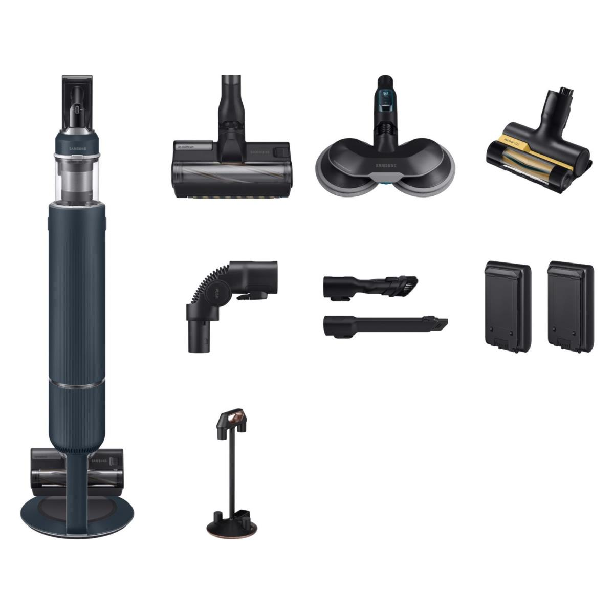 Zdemontowany odkurzacz z różnymi nasadkami. Główna jednostka jest granatowa, a nasadki są czarne.