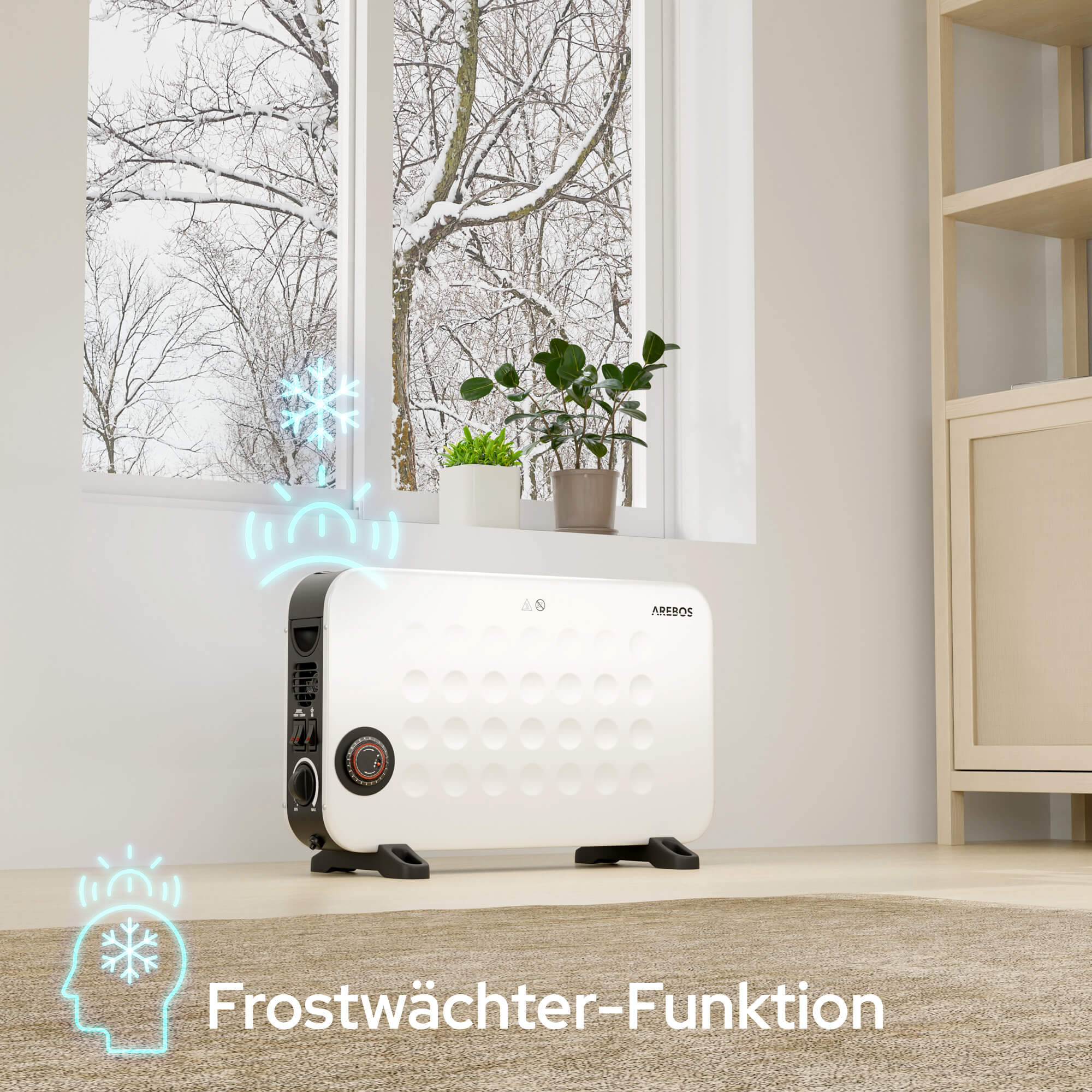 Ein weißer Elektroheizer steht auf einem Teppich. Durch das Fenster ist eine schneebedeckte Szene zu sehen. Der Text lautet 'Frostwächter-Funktion'.