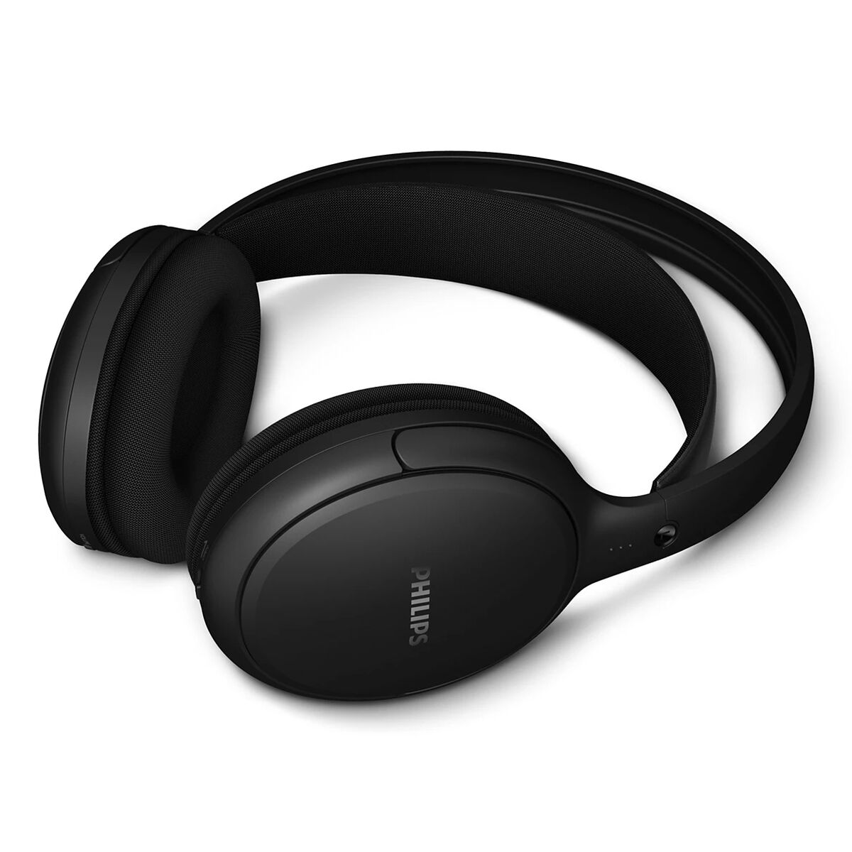 Cuffie Philips nere, leggermente angolate. Le cuffie poggiano su una superficie bianca, con il marchio visibile sull'auricolare.