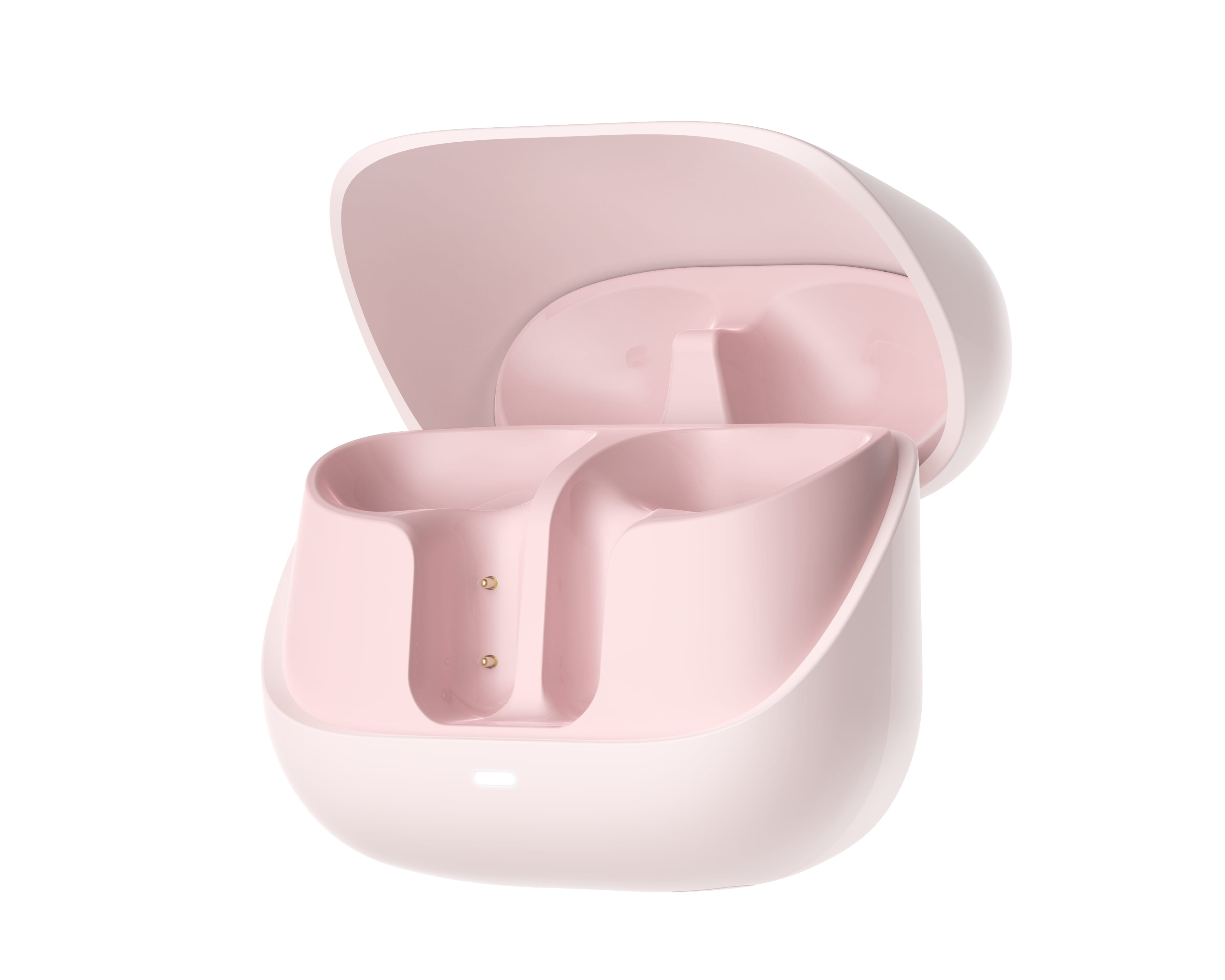 Różowe etui ładujące słuchawki, otwarte. Pokazuje dwie komory i światło. Pokrywa jest częściowo otwarta.