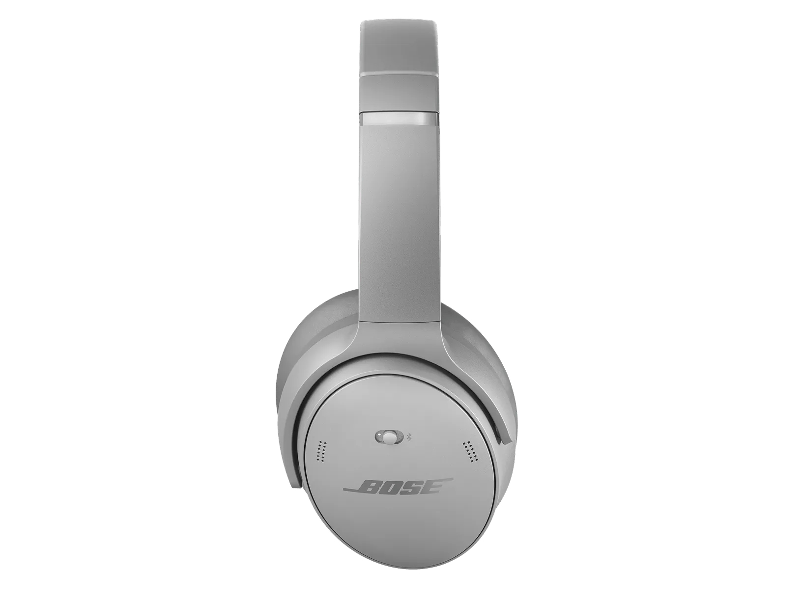 Un paio di cuffie Bose argentate con cancellazione del rumore. Ha padiglioni, archetto e pulsante di accensione. Il marchio è visibile.