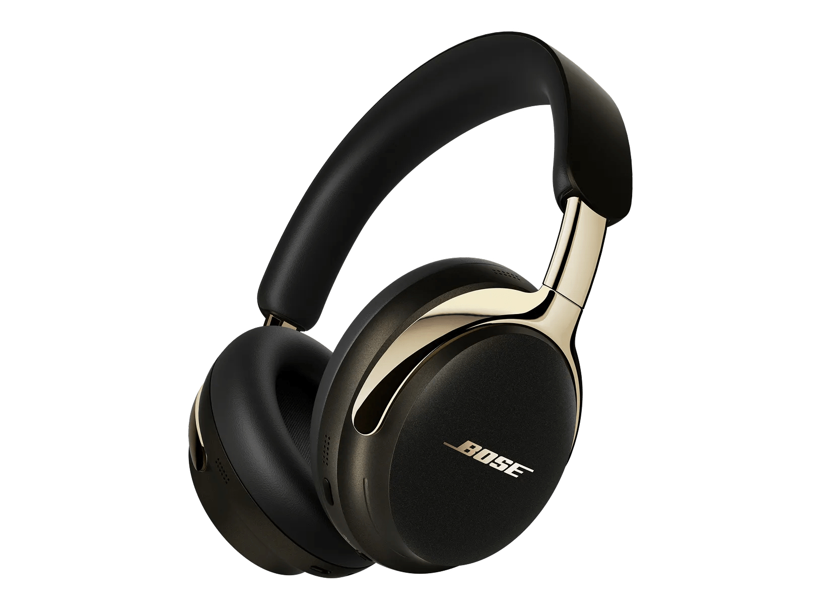Auriculares Bose negros y dorados sobre fondo blanco. Los auriculares están en ángulo para mostrar los auriculares y la diadema.