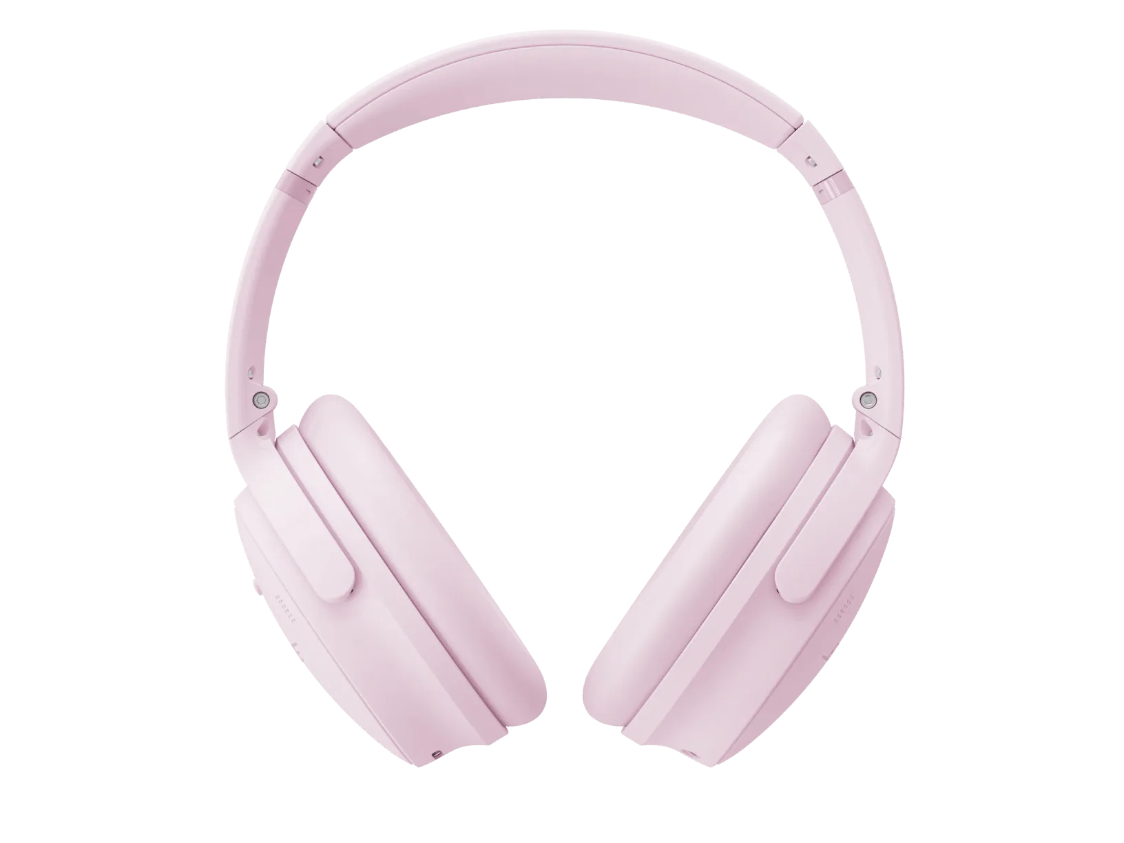 Un paio di cuffie rosa, con padiglioni e archetto, centrate su sfondo bianco.