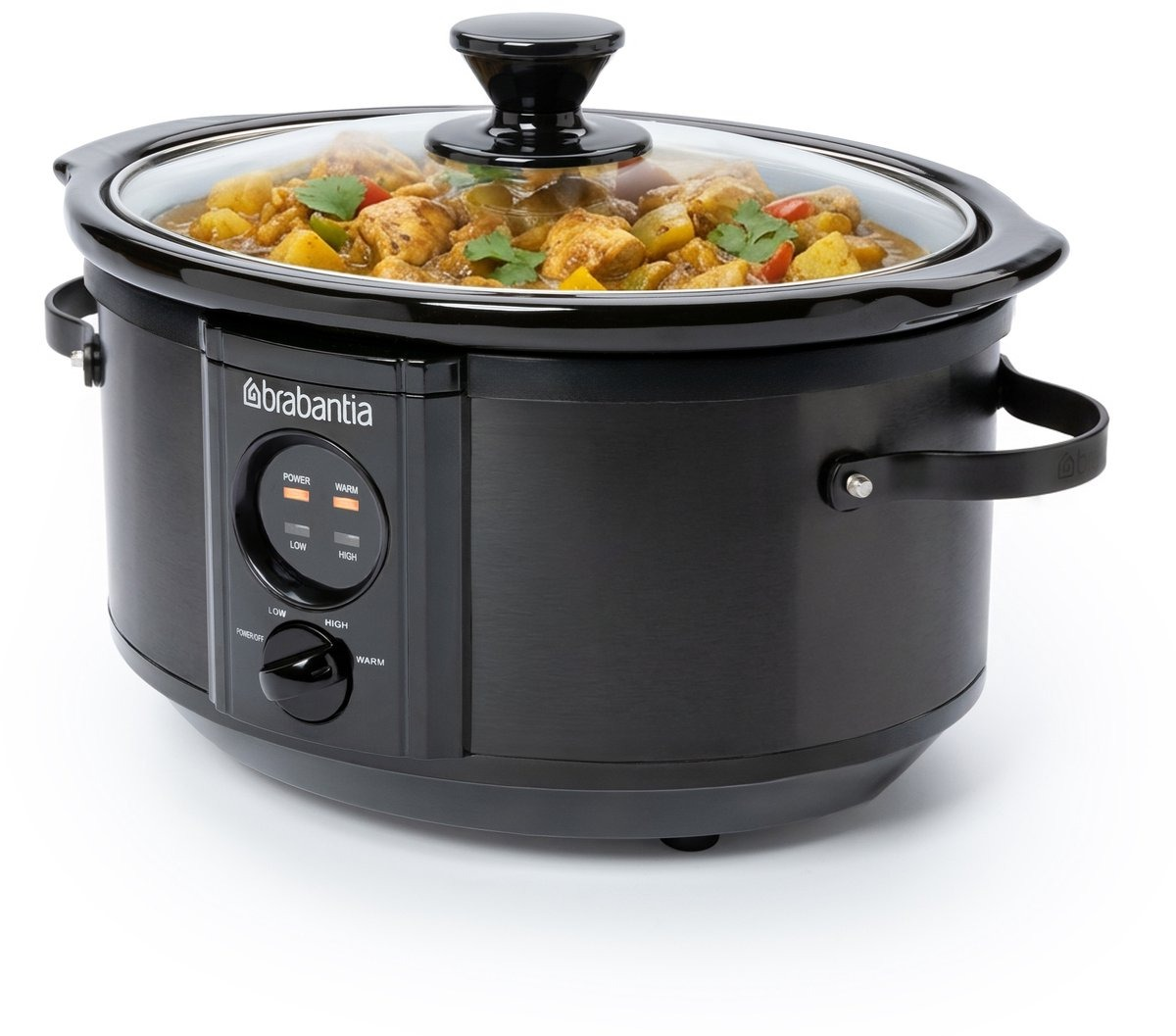 Mijoteuse Brabantia noire avec couvercle en verre, remplie de curry. Panneau de commande avec réglages de puissance et de température.