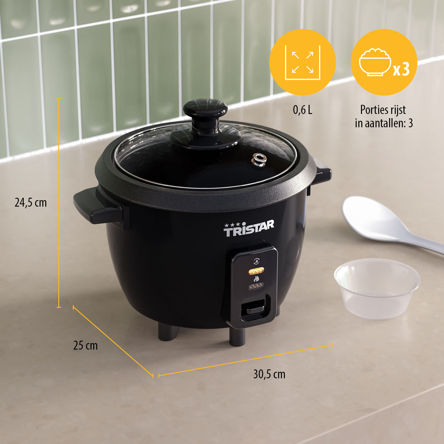 Black Tristar rice cooker with a glass lid, a white spoon, and a small bowl on a light countertop.
