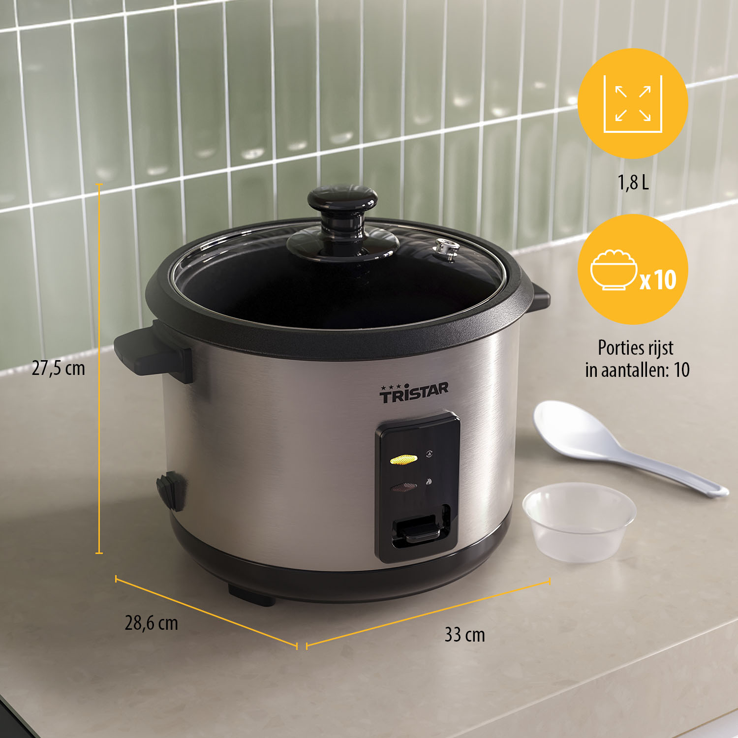 A silver Tristar rice cooker with a glass lid. Includes a spoon and a small bowl. Dimensions are displayed next to the device.