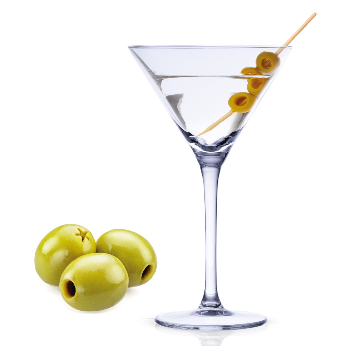 A martini glass with olives on a stick. Three green olives are on the side. The background is white.