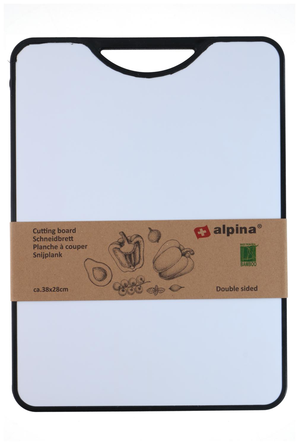A white cutting board with a black border. It has a brown paper wrap with drawings and text. The brand Alpina is visible.