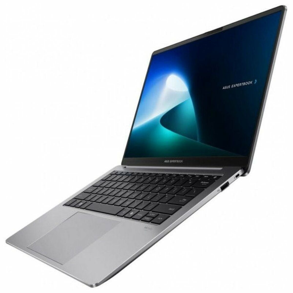 Una laptop plateada Asus ExpertBook está abierta. La pantalla muestra un diseño azul y blanco. El teclado es negro.